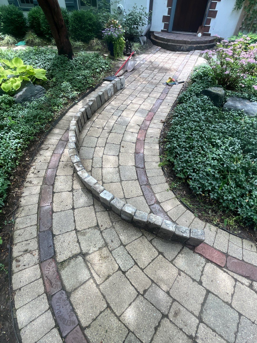 Glencoe, IL brick paver clean sand seal, repair, and reseal by Northern Power Washing LLC.