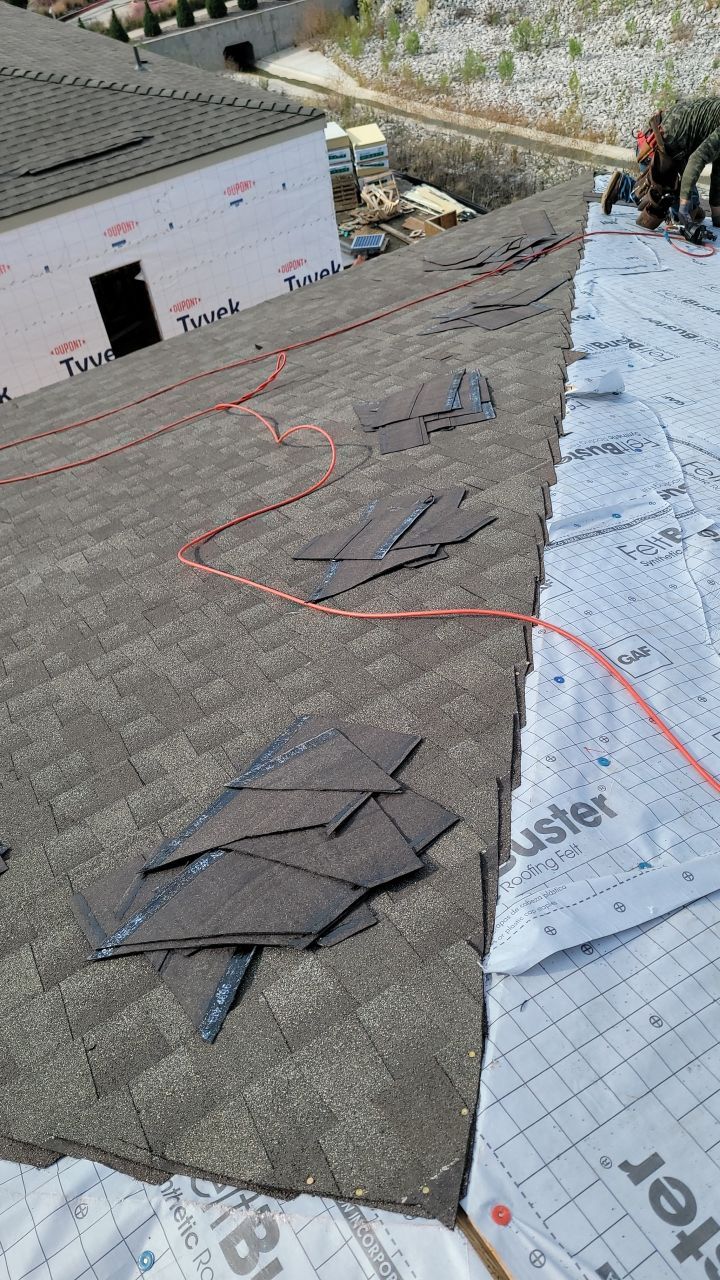 Apartment Roofing Installation using GAF HDZ Shingles, GAF TPO and Pavers in Lewisville, TX by Roof Experts