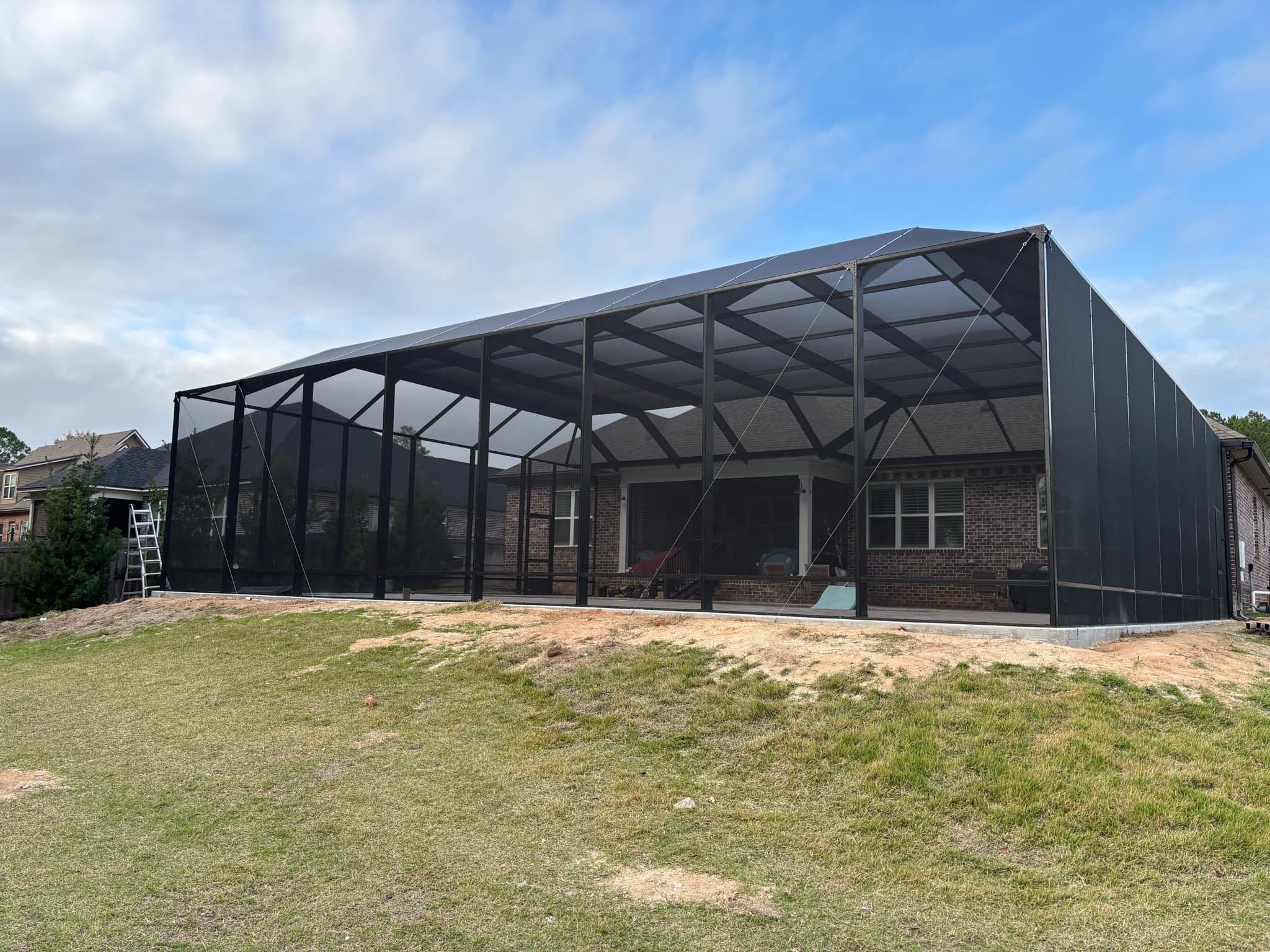 Titan Pool Cage in Baker, FL by Titan Sunrooms