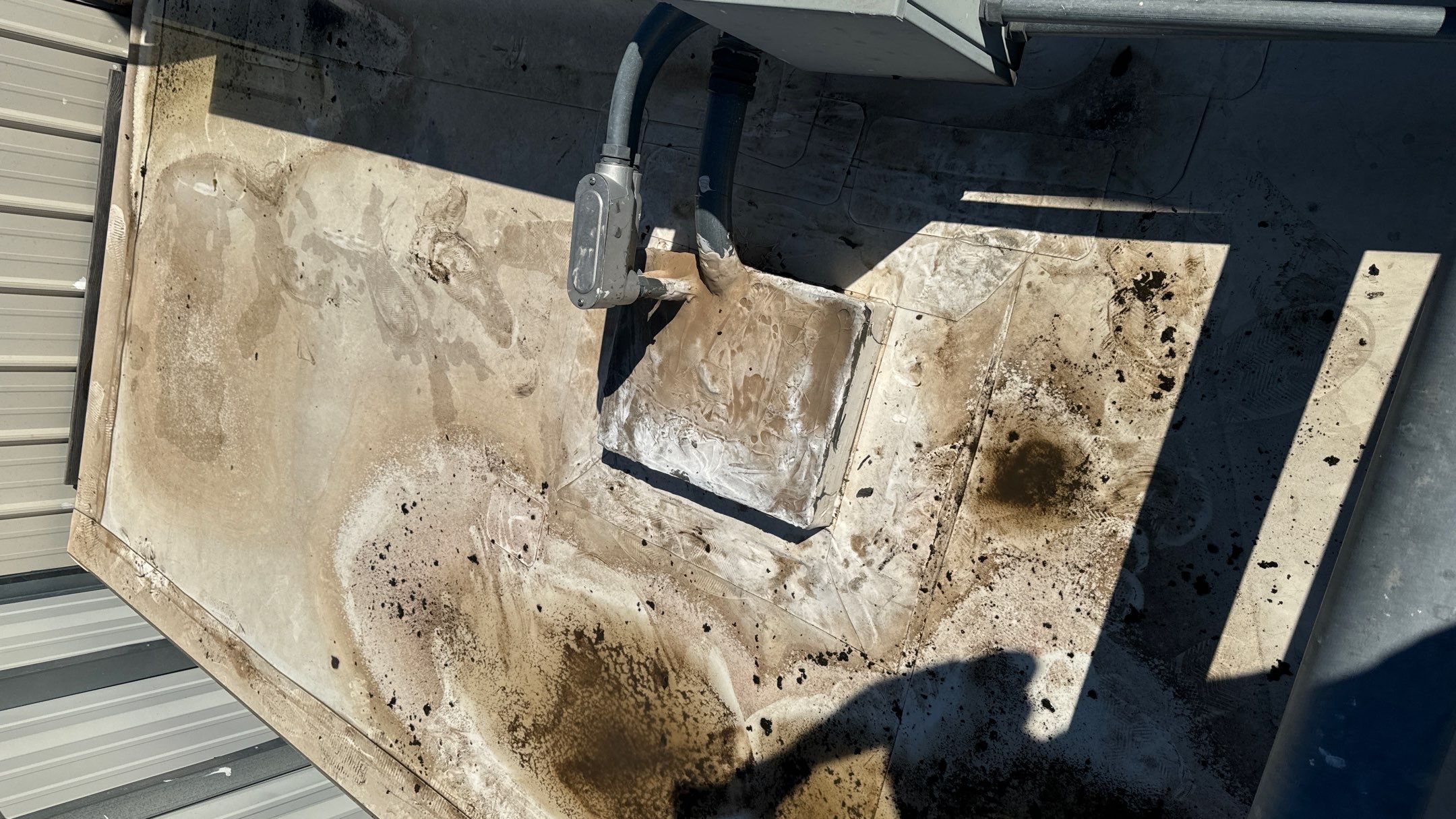 Commercial Roofing Repair using TRP #924 Eterna-Sil Premium Silicone Roof Coating by Harvey Roofing & Construction