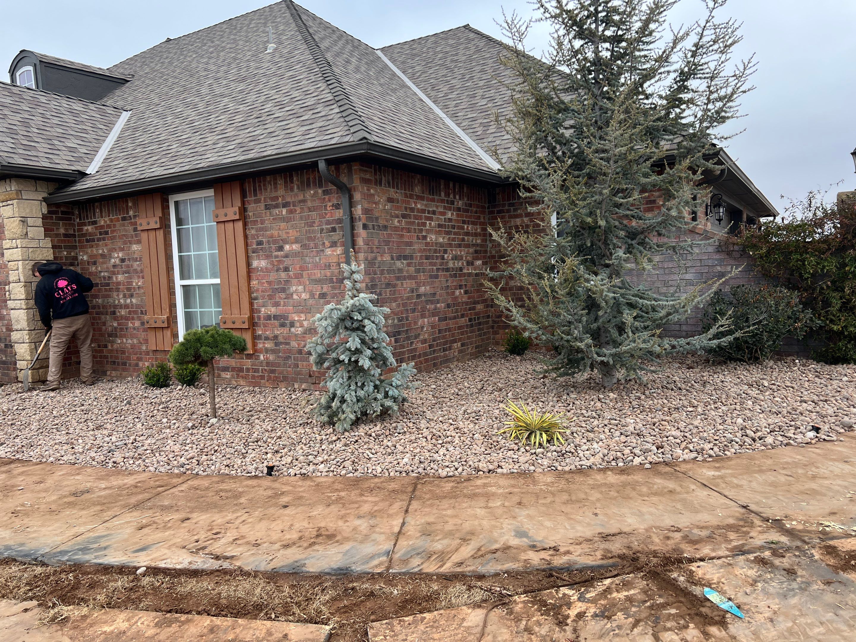 Landscape installation w/ irrigation and landscape lighting by Clays Services Inc