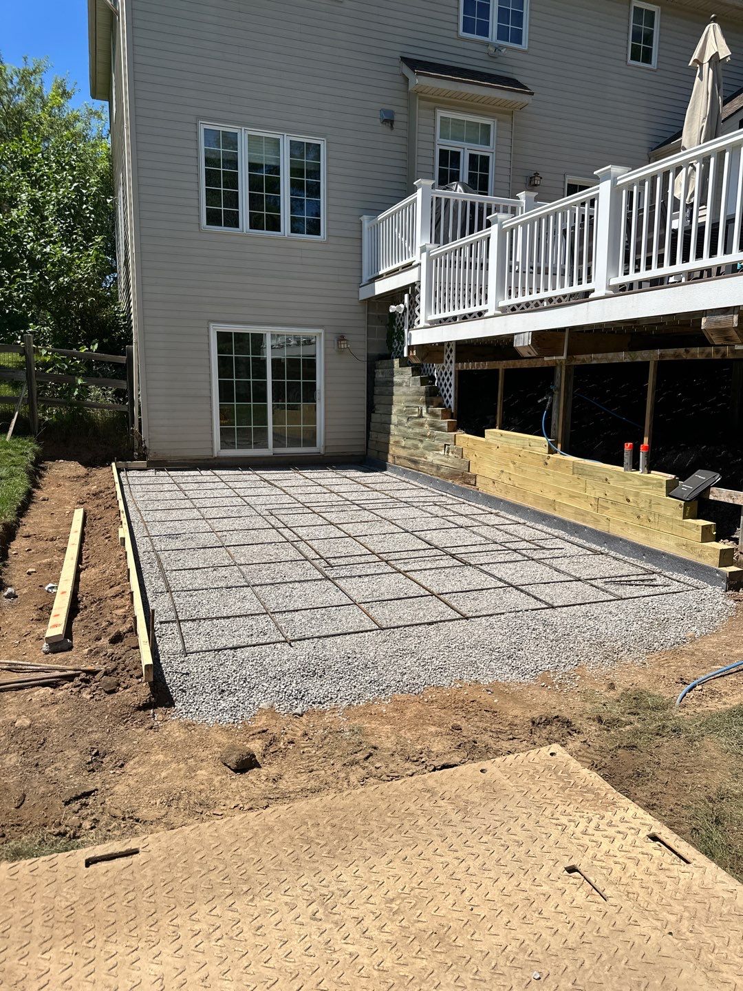 Rolled slate stamped patio  by NG Masonry & Construction LLC