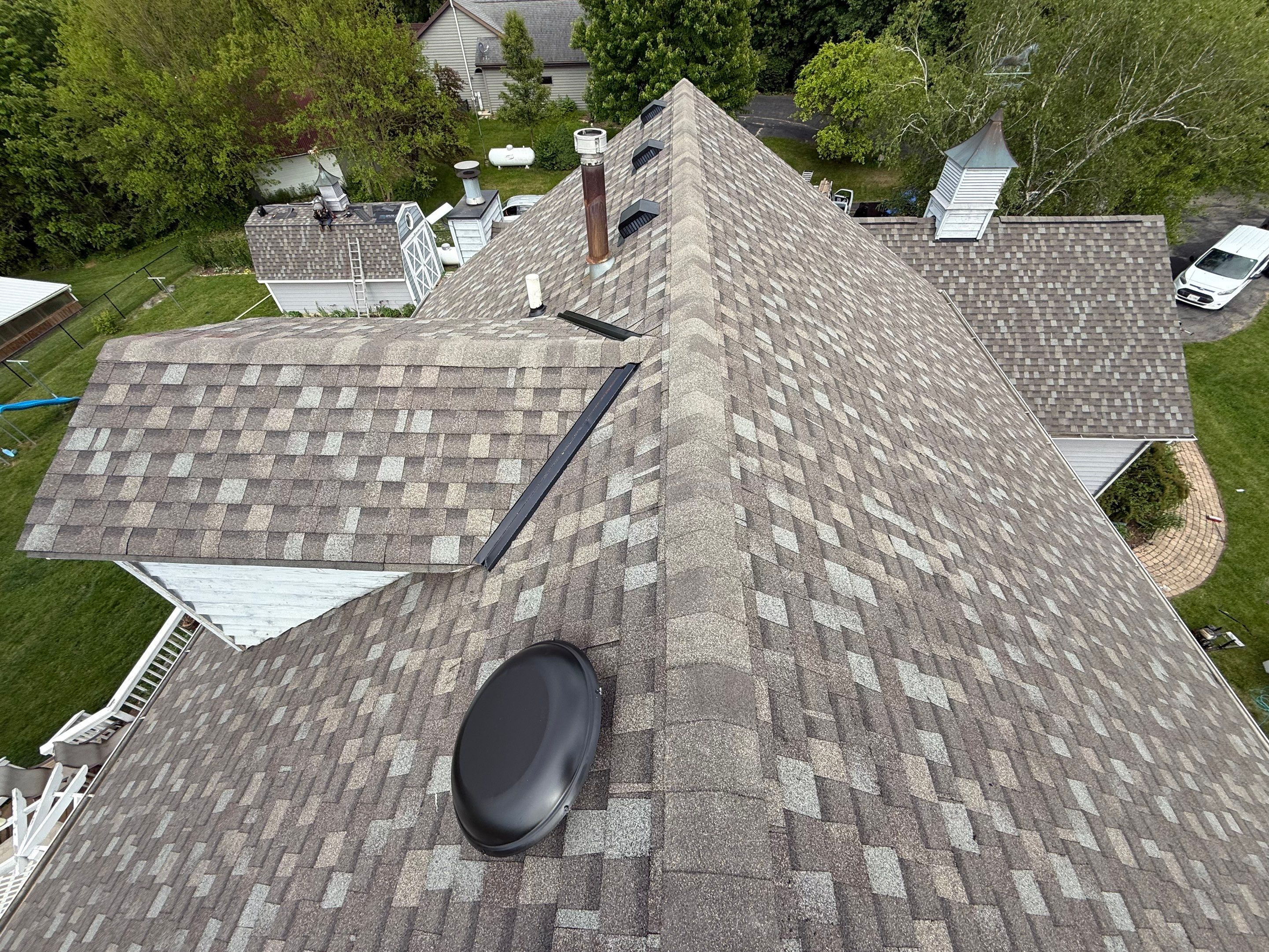 Roofing, copper chimney cap and copper awning by Optimal Home Improvement 
