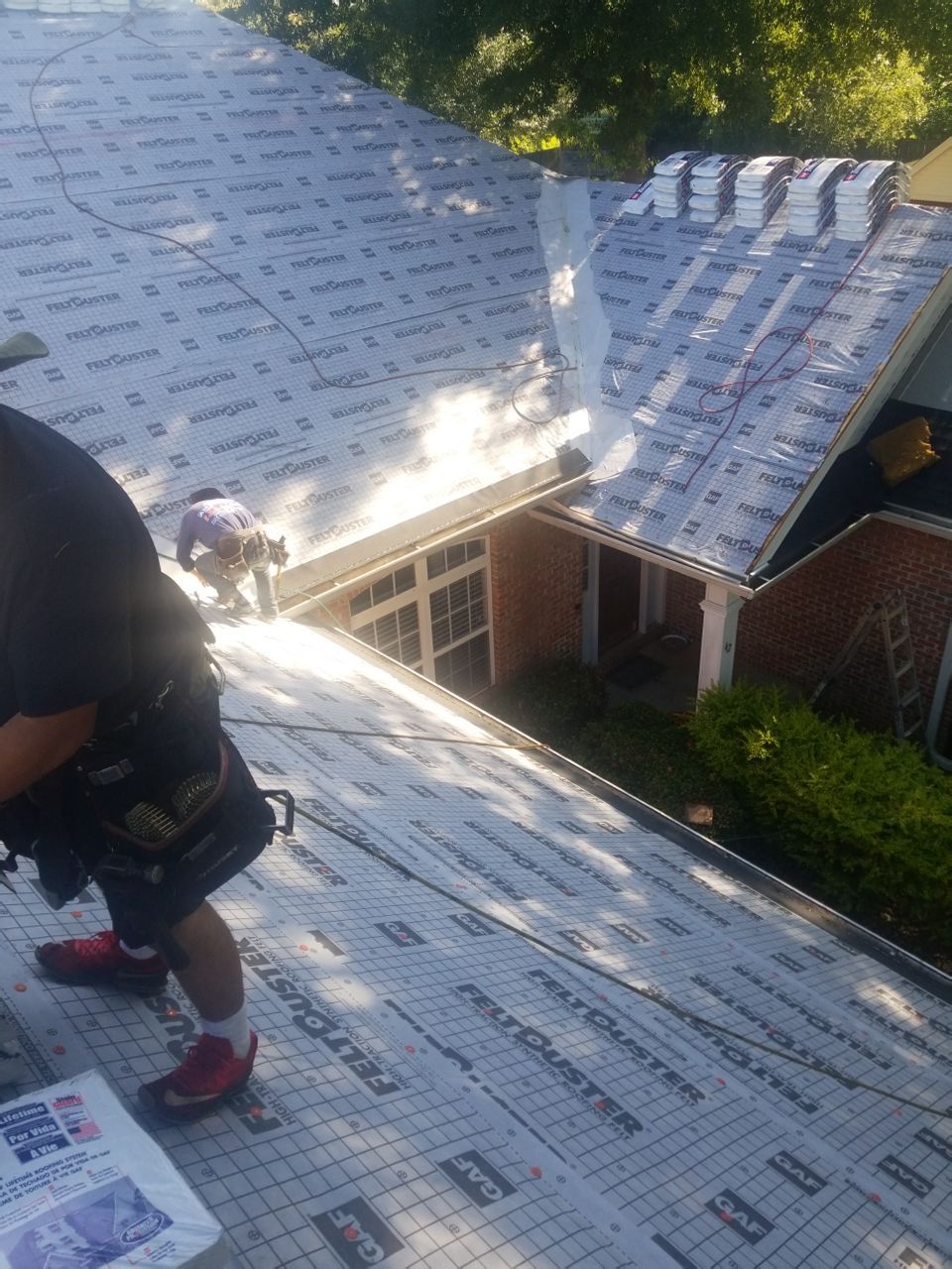 Residential Roofing Installation using Roof Replacement by American Roofing & Construction LLC