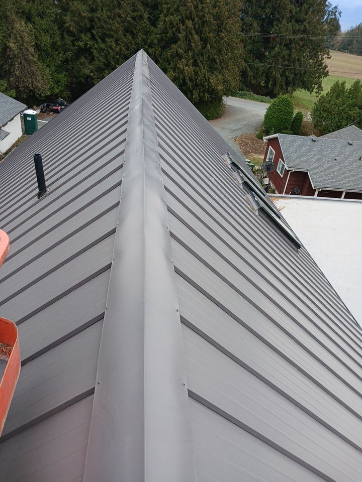 Residential Roofing Installation using multiple products by Top Notch Roofing Inc