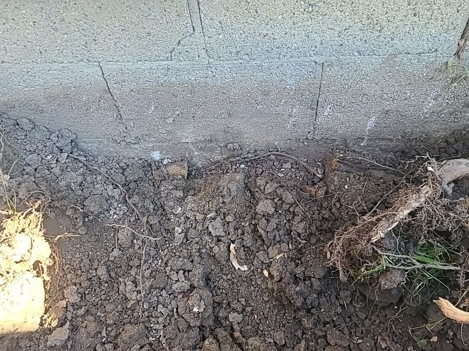 Lifting Home With Piers using Magnum Piers by Toledo Basement Repair