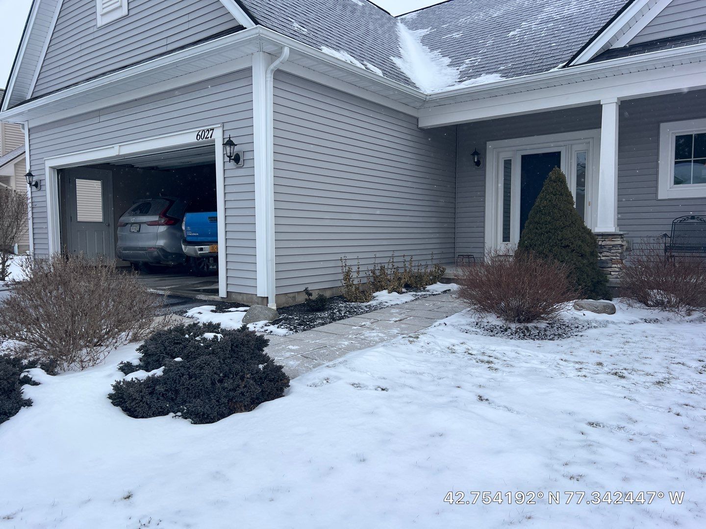 Stamped English Rivenstone concrete patio and sidewalks  by NG Masonry & Construction LLC