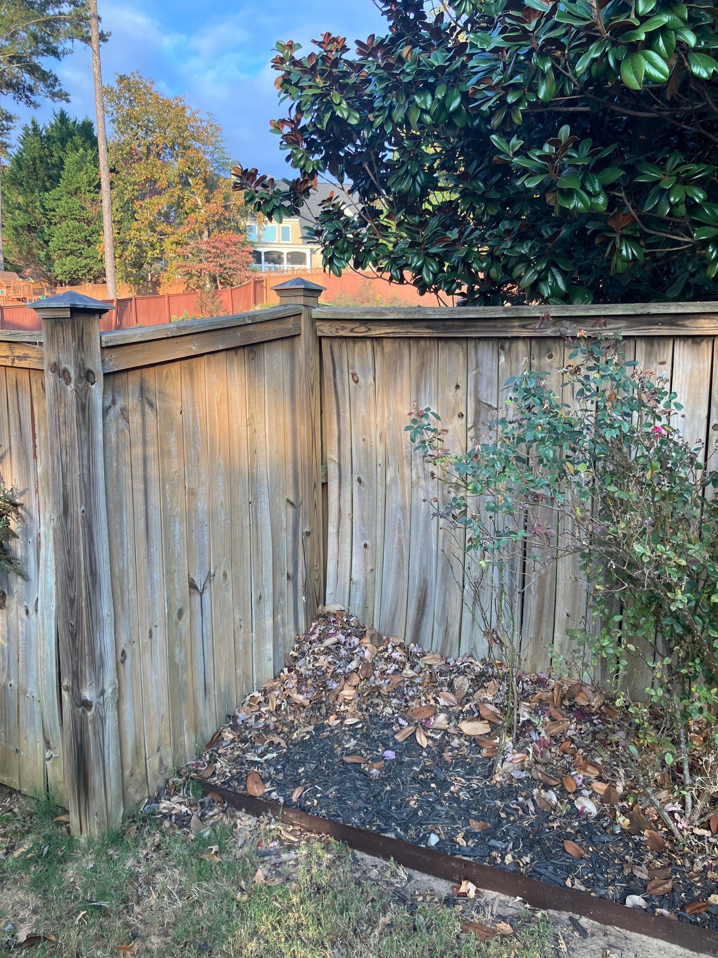 Fence Installation of Capped Wood Privacy Fence using 6X6 posts and copper post caps.  by Titans of Timber Fence & Stain