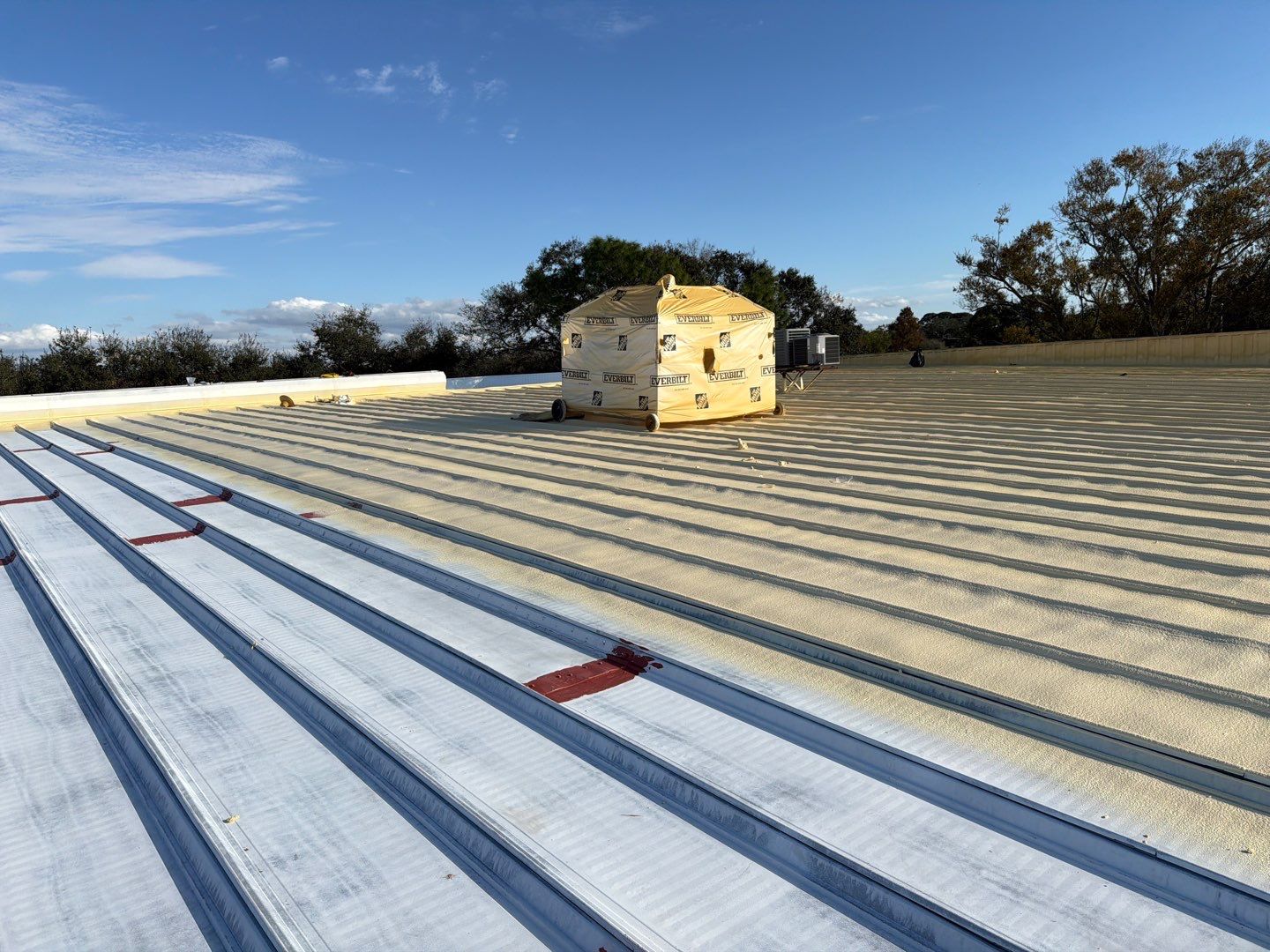 Sarasota Industrial Warehouse Metal Roof Silicone Coating Restoration by CES Roofing