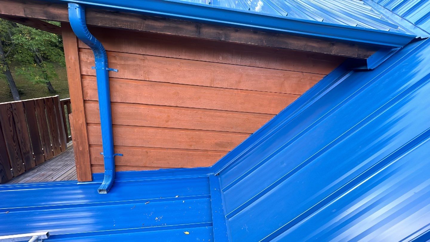 Residential Roofing Installation using Standing Seam Metal - Gallery Blue by RoofX 