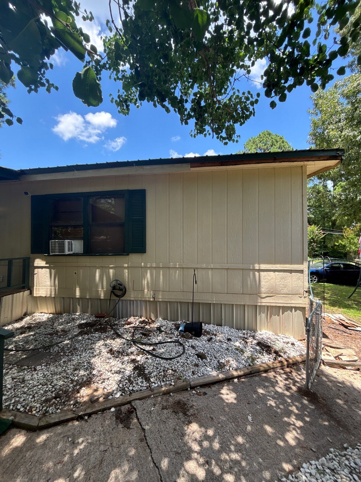Full Exterior Revamp with Fence Staining in Flint, Texas by Quality Coats Painting