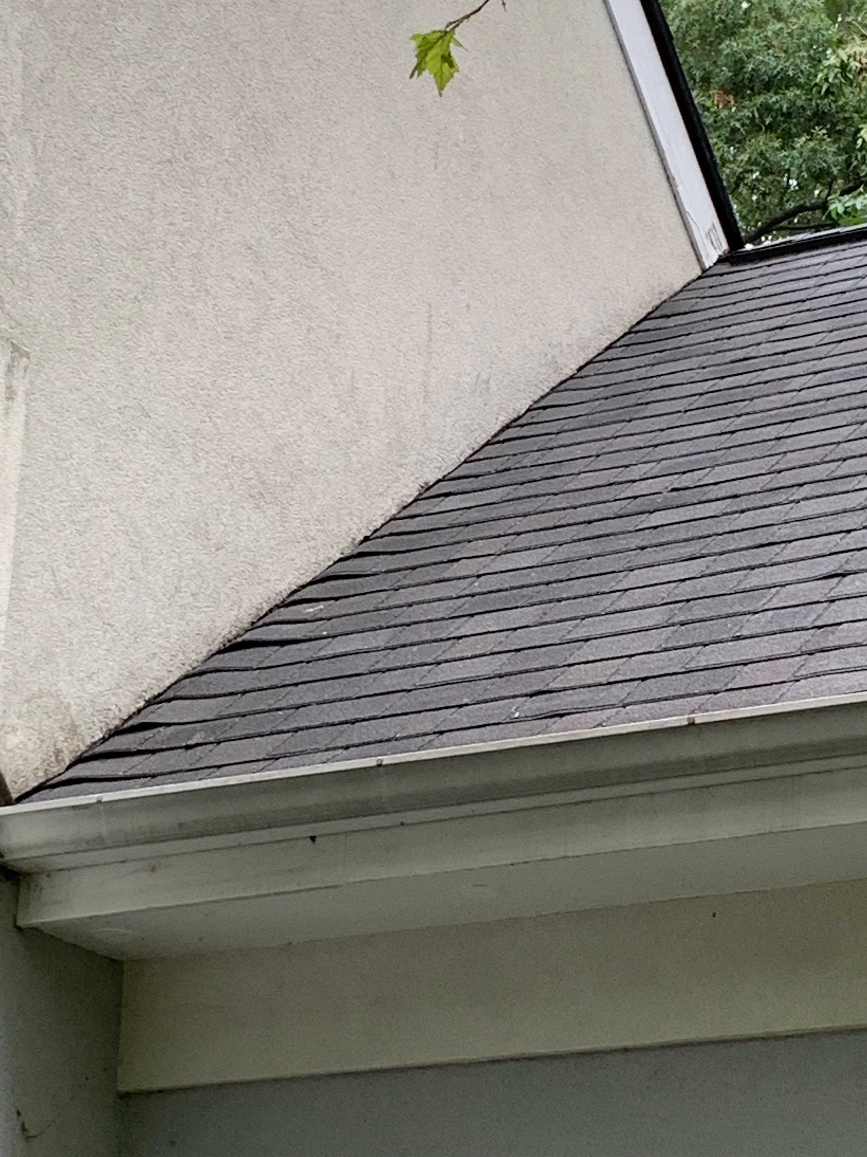 Skylight, Roof, and Gutter Replacement by American Home Contractors