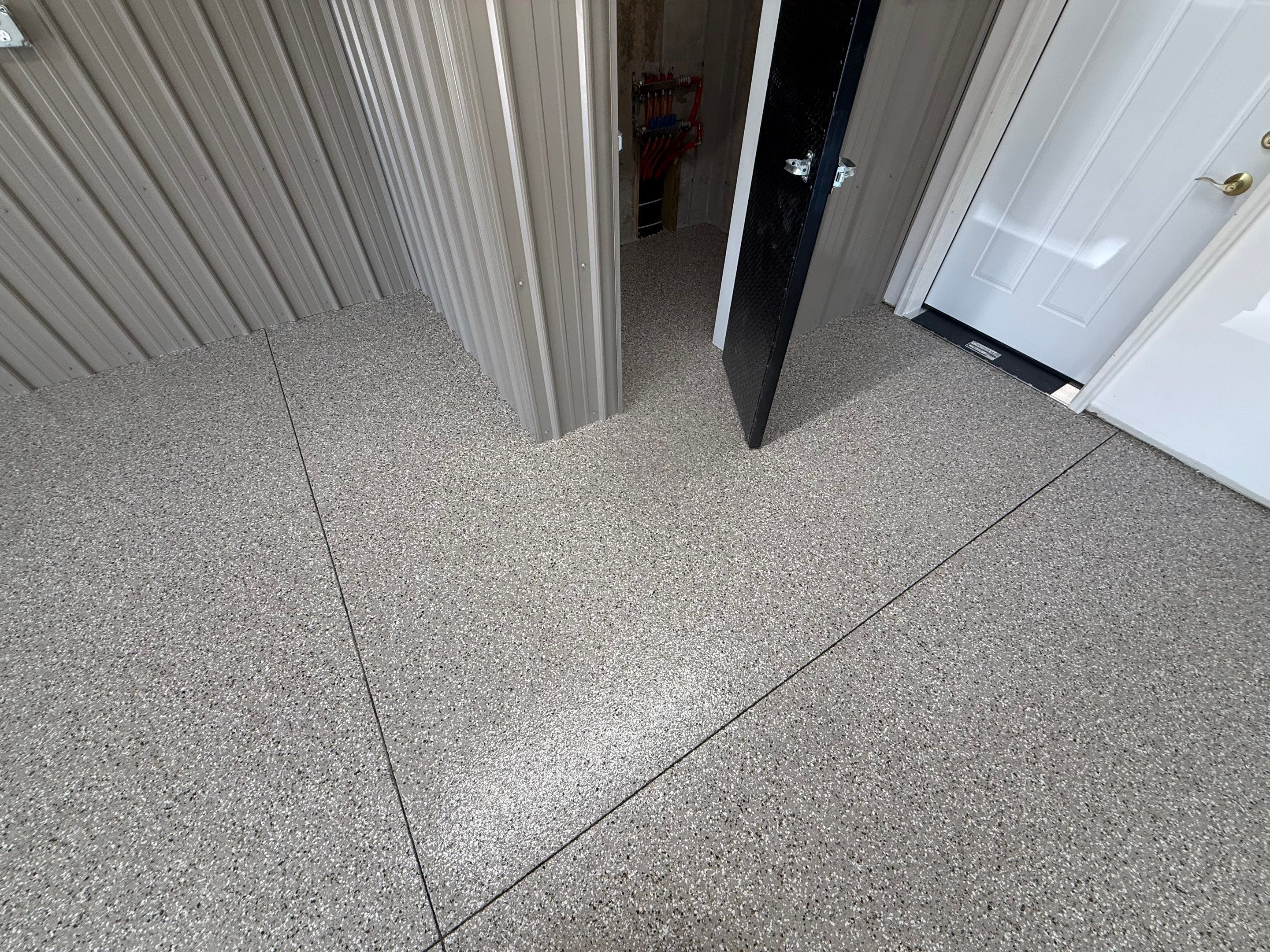 Creekbed Flake Coating in Woonsocket, SD by Select Painting, Coatings & Garage Cabinets