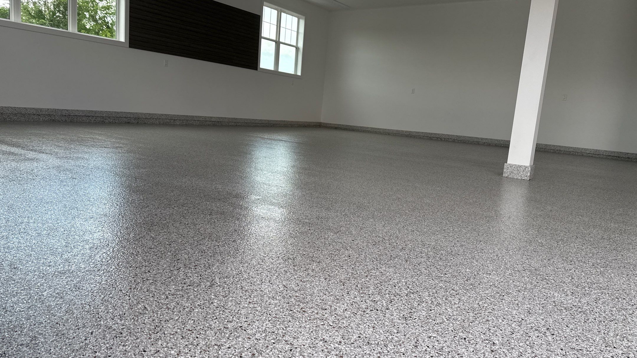 Christopher Has A Beautiful New Floor by Banner Garage