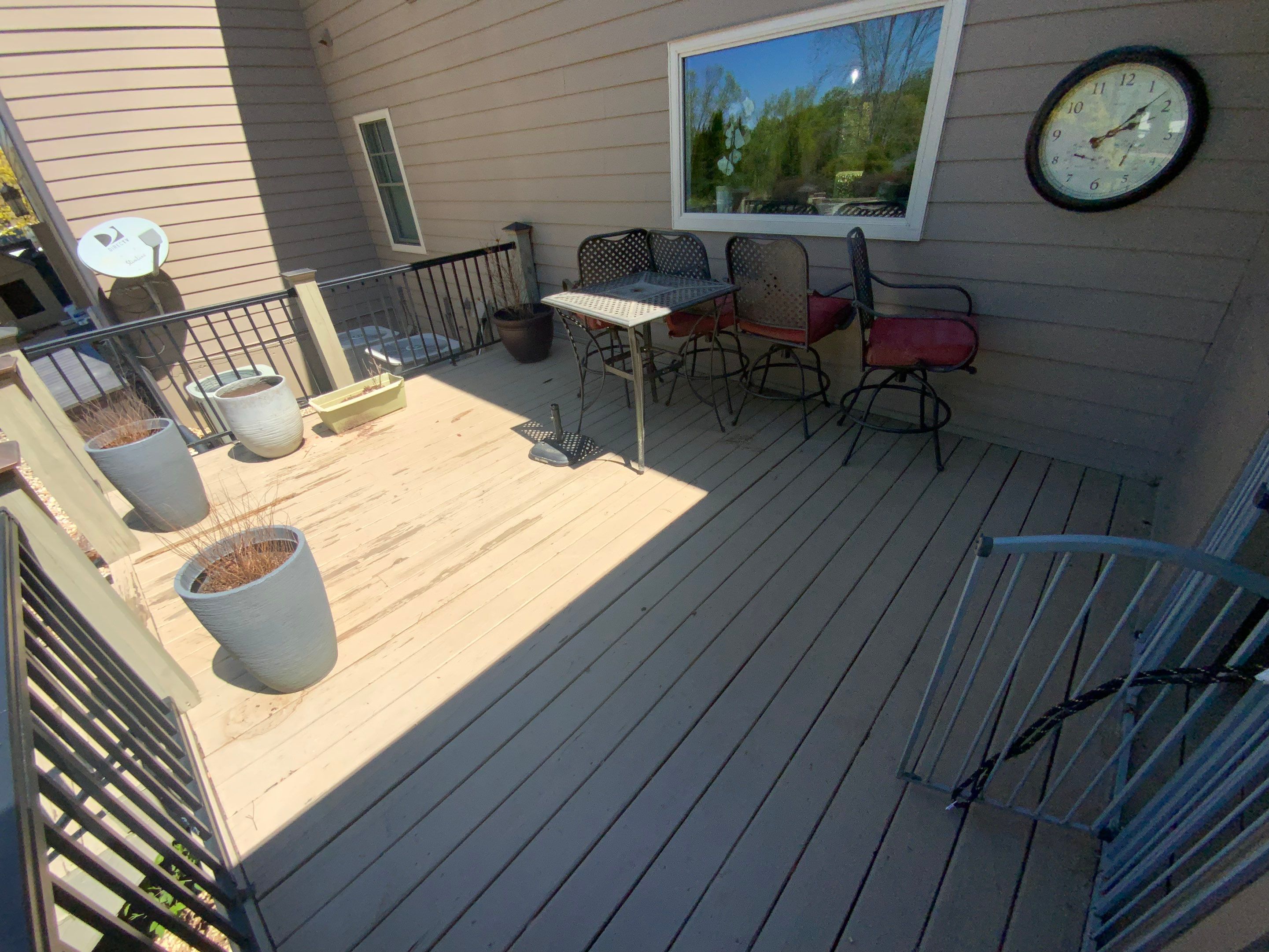 Composite Deck Flooring and Black Metal Railing Replacement in Dallas by Swift Home Renovations