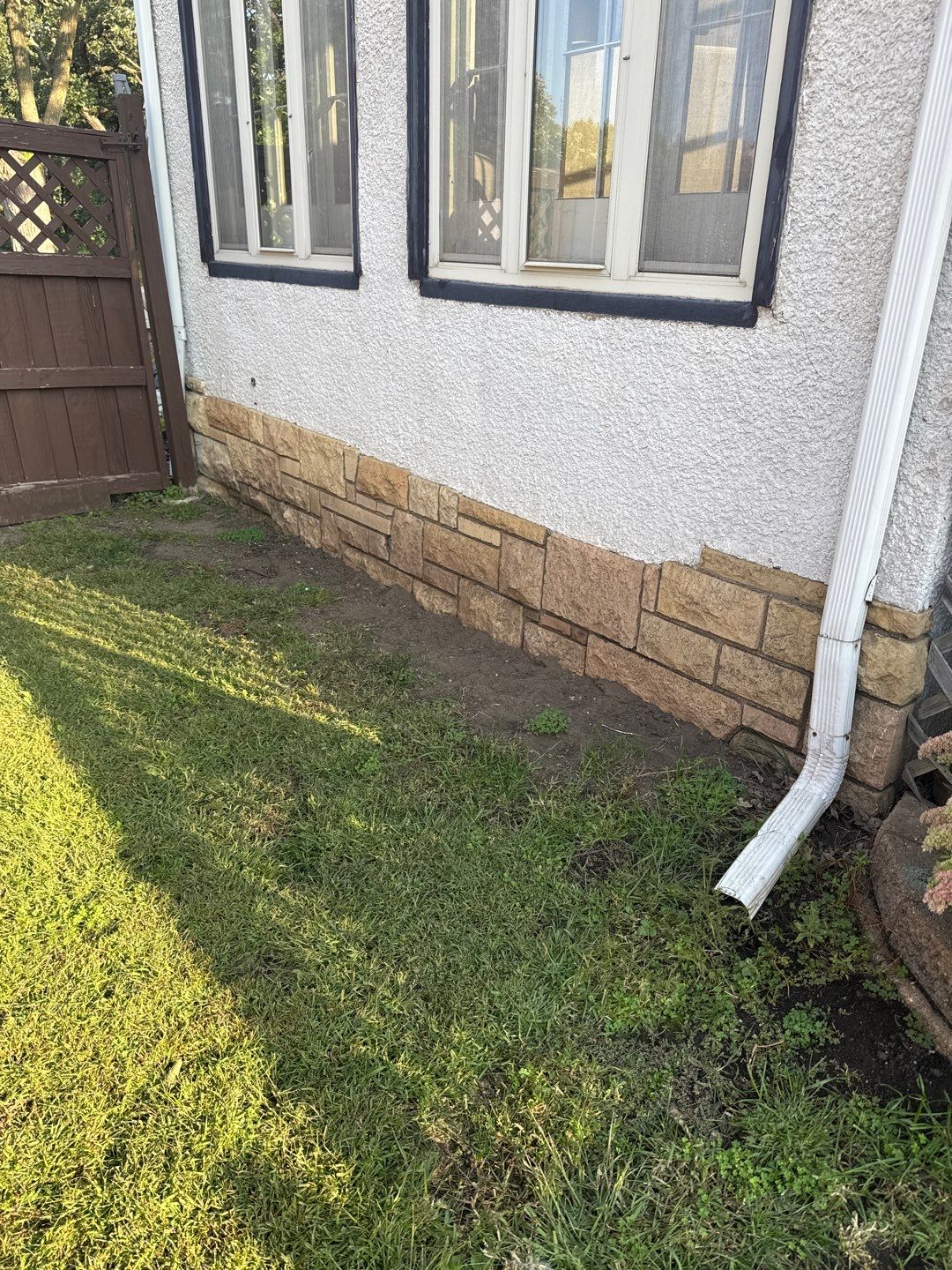 Window Wells & Foundation Grading in South Minneapolis by Waterproofing Northeast