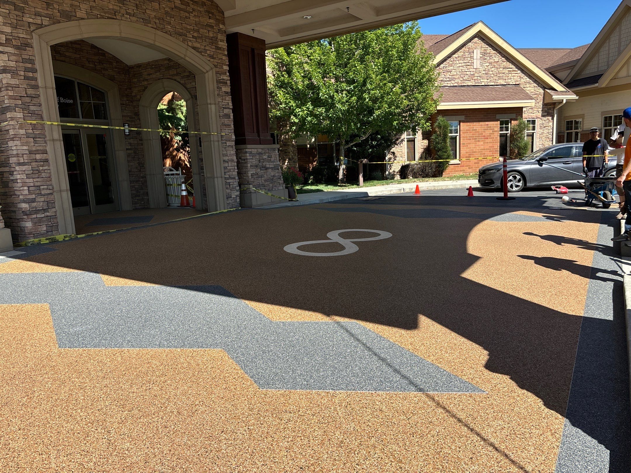 Custom Logo Inlay for Retirement Village by Mr. Mudd Concrete