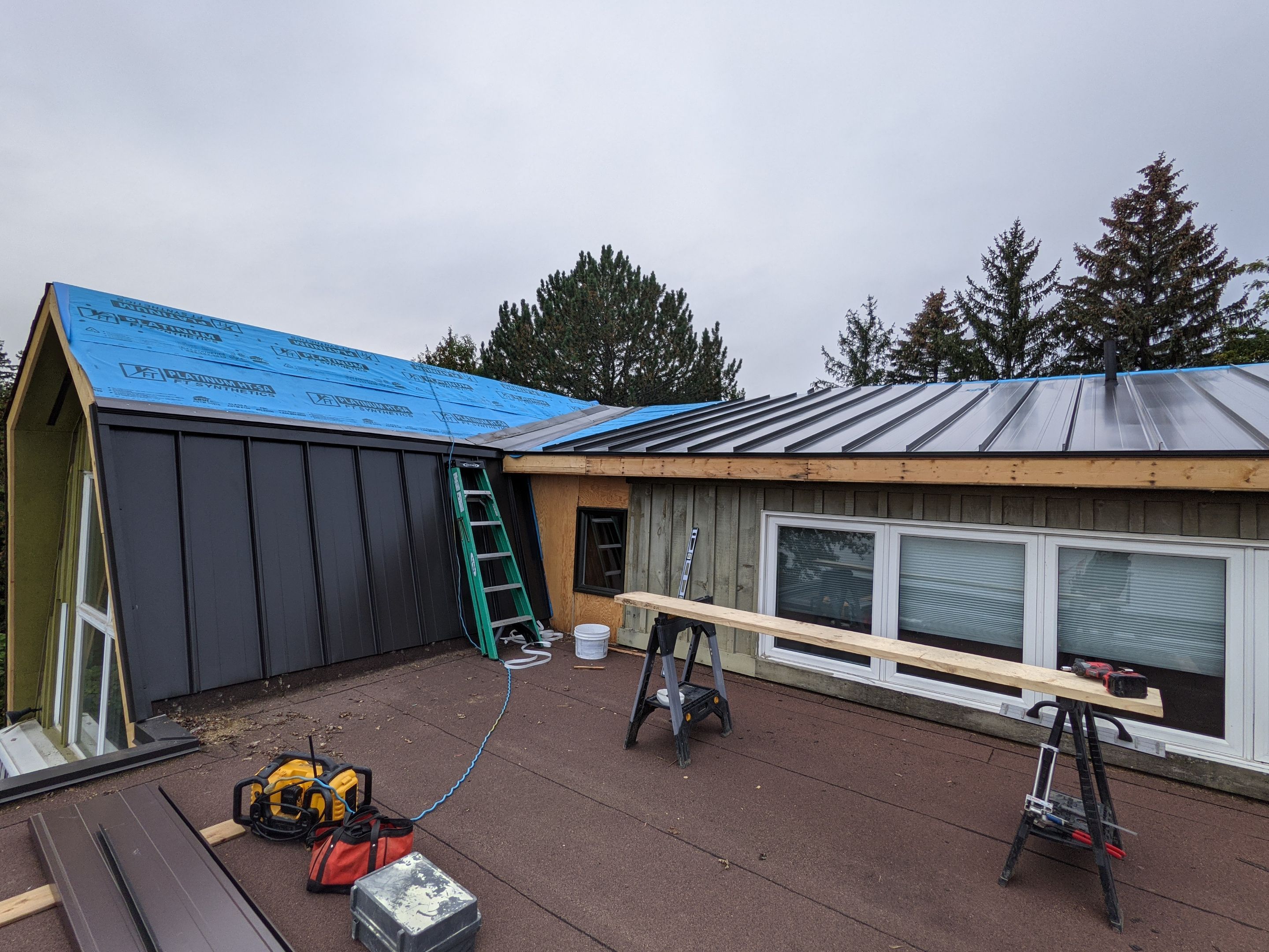Residential Roofing Installation using 16" Standing Seam Panels by Jay Carter Roofing & Sheet Metal