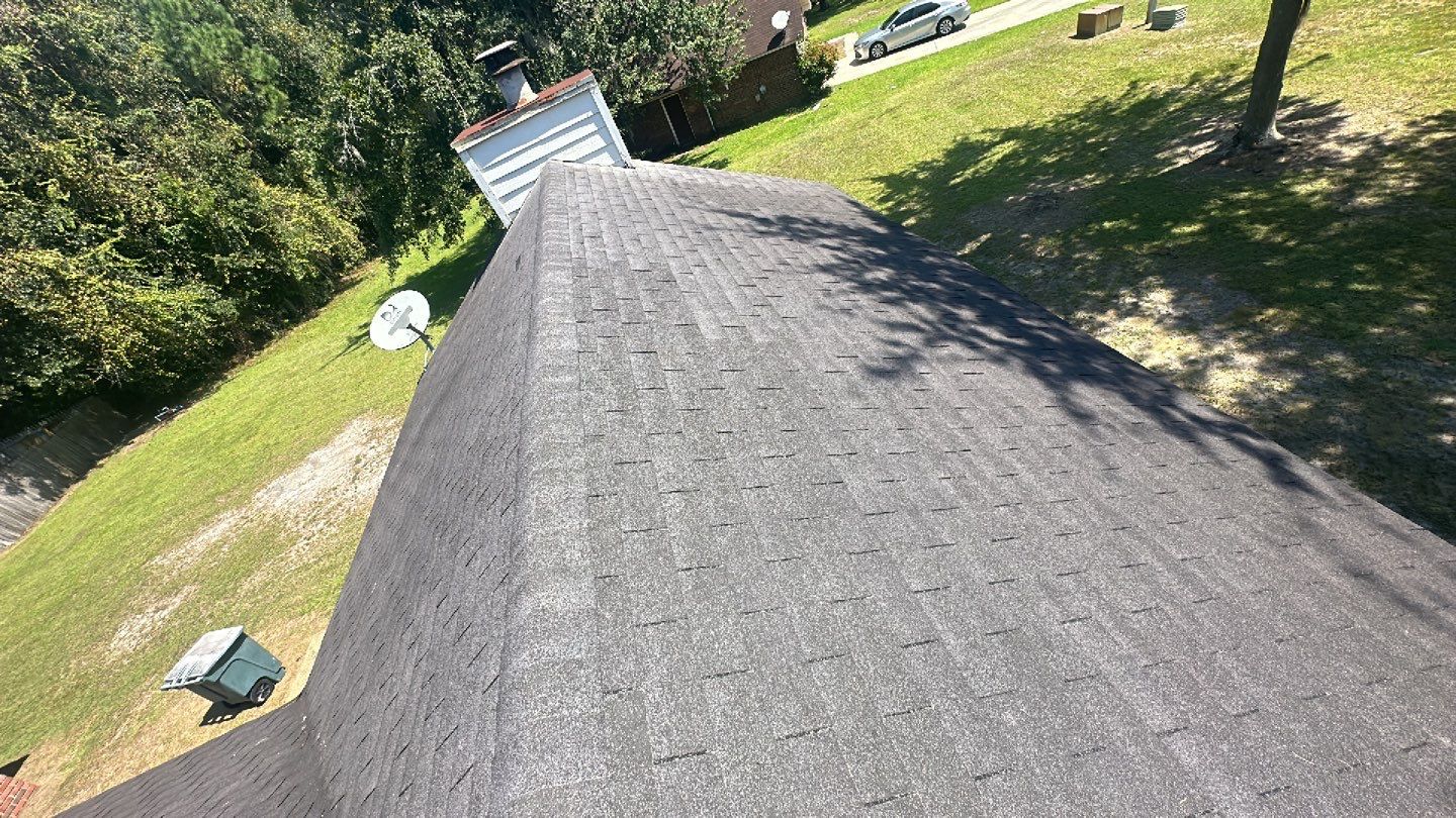 Residential Roofing Installation using Benton 26Ga 1inc Snapcock Metal Roof KYNAR Matte Black by Talya Roofing