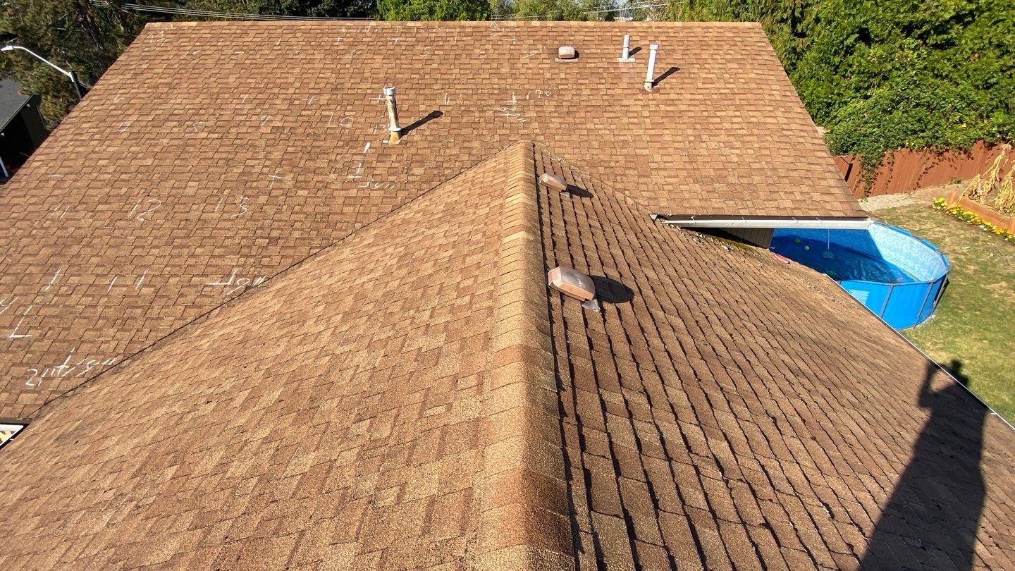 Estate Gray Shingles by Reimagine Roofing