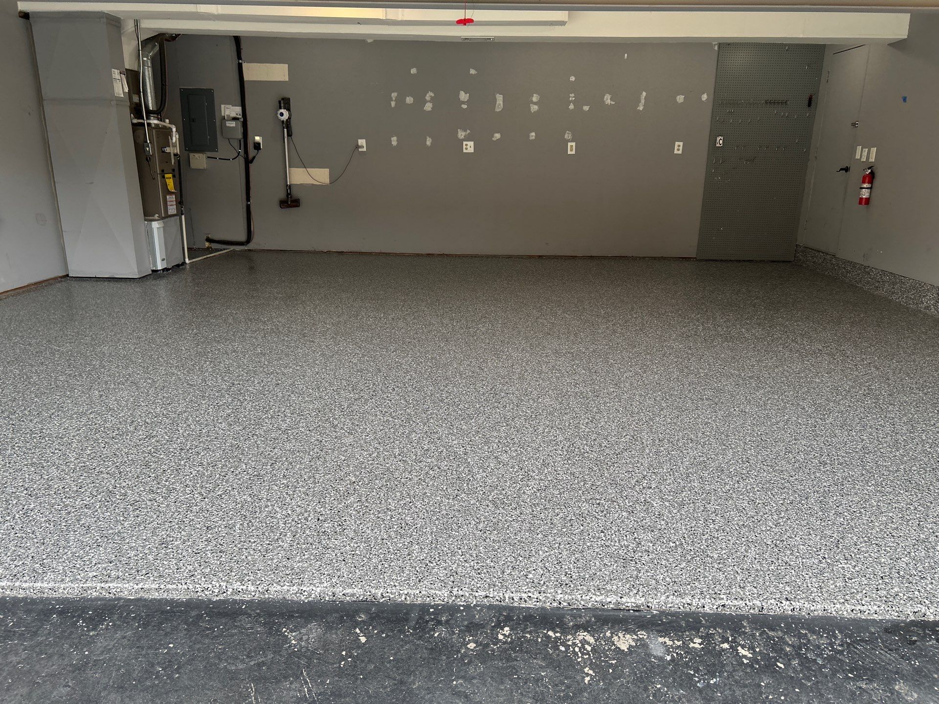 Smoke Concrete Coating in Elkhart! by Innovative Spaces / Innovative Concrete Coatings
