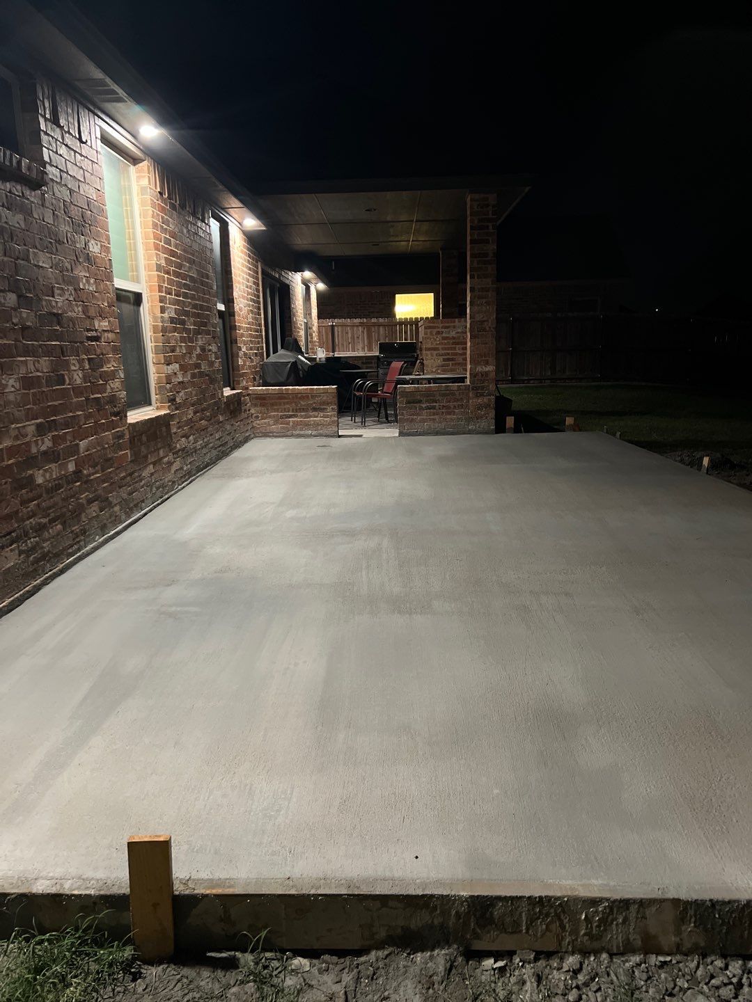 Concrete slab with Pergola by Clays Services Inc