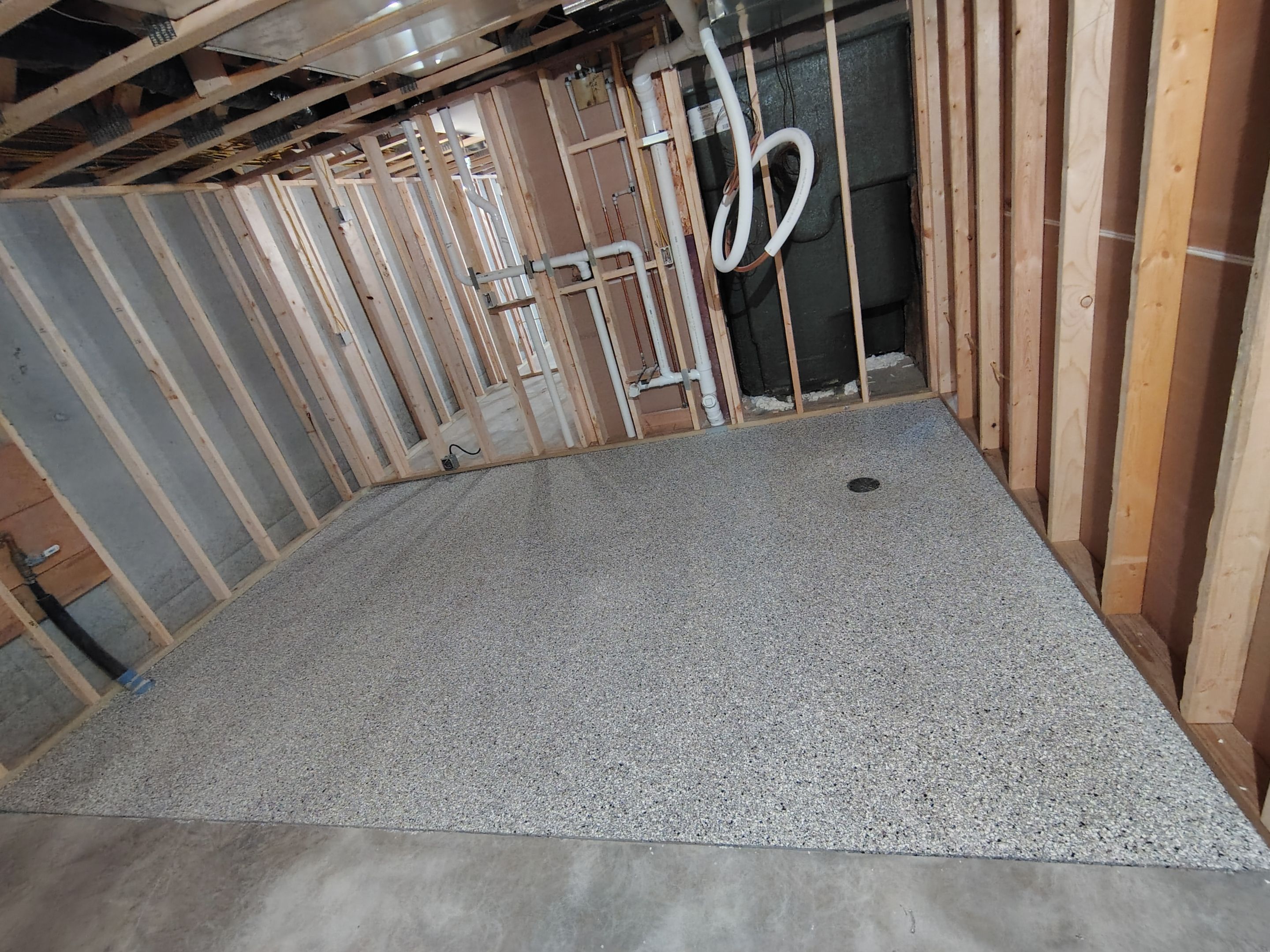 Custom Garage and Basement Epoxy Floor Coating in Menno by Select Painting, Coatings & Garage Cabinets