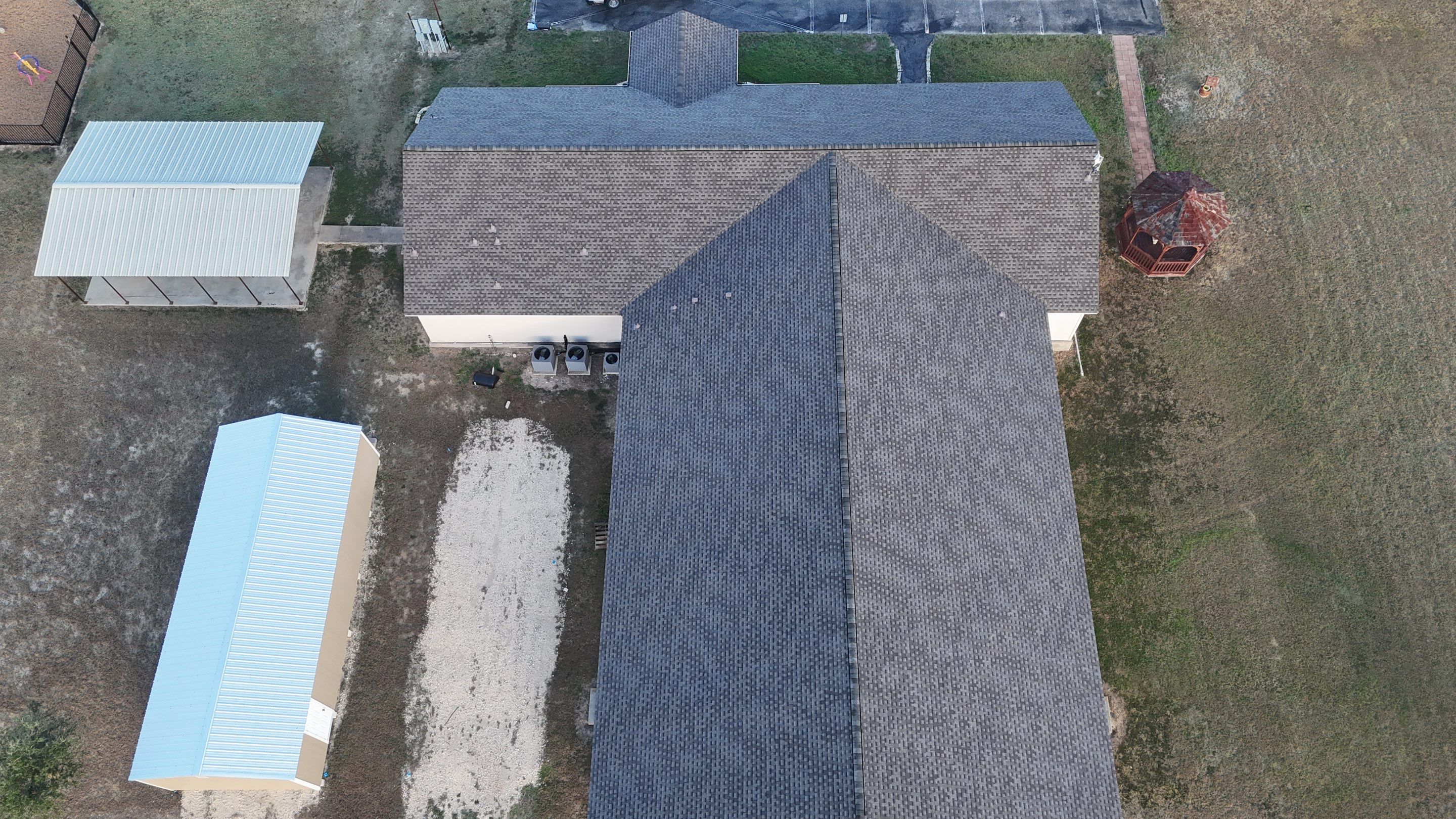Commercial Roofing Installation using GAF - HDZ - Weathered Wood by Action Exteriors Austin