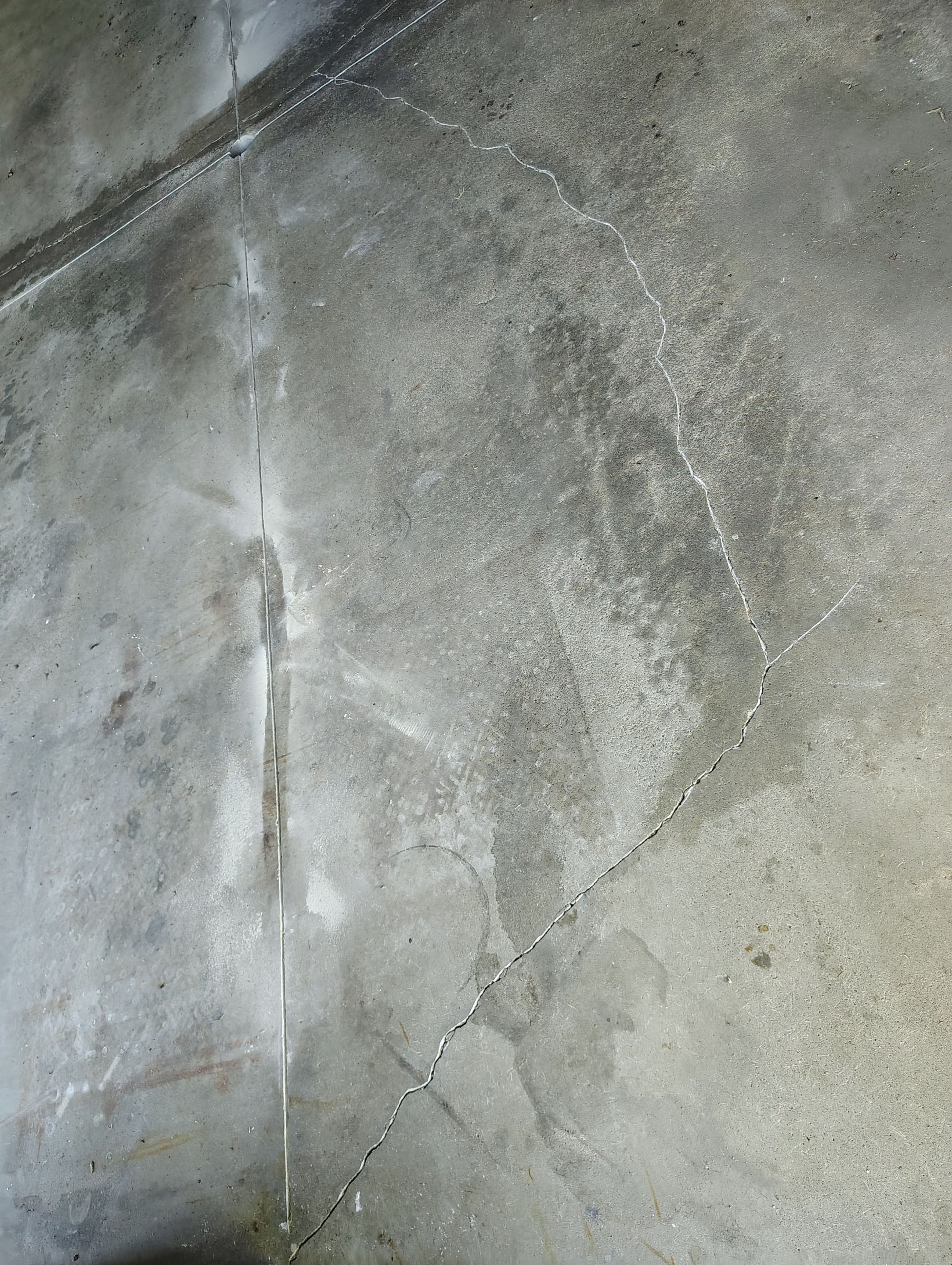 Sioux Falls Garage Concrete Repair and Epoxy Flake Floor Coating by Select Painting, Coatings & Garage Cabinets