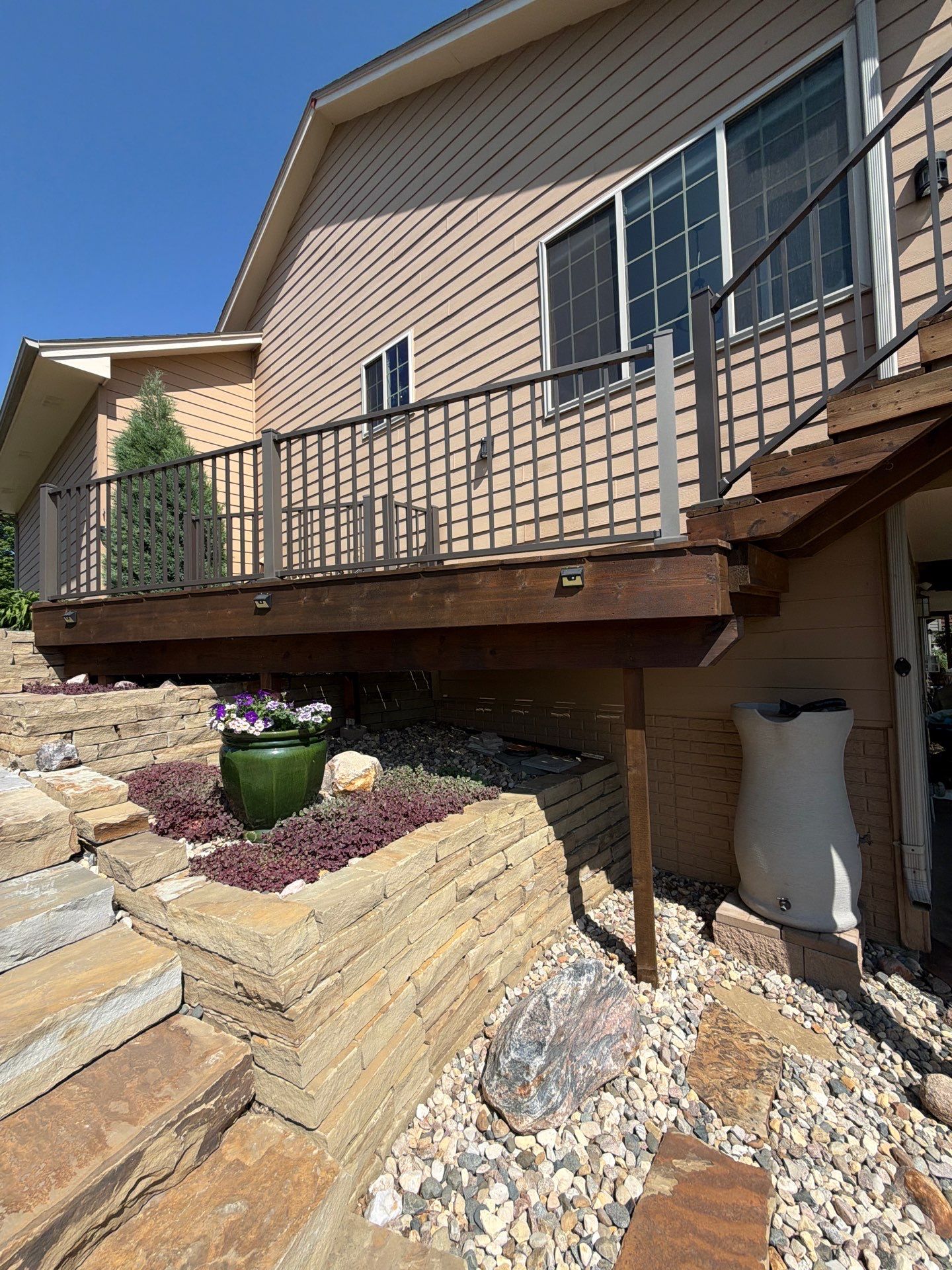 Tiered Wood Deck and Pergola Refinishing in Sioux Falls by Select Painting, Coatings & Garage Cabinets