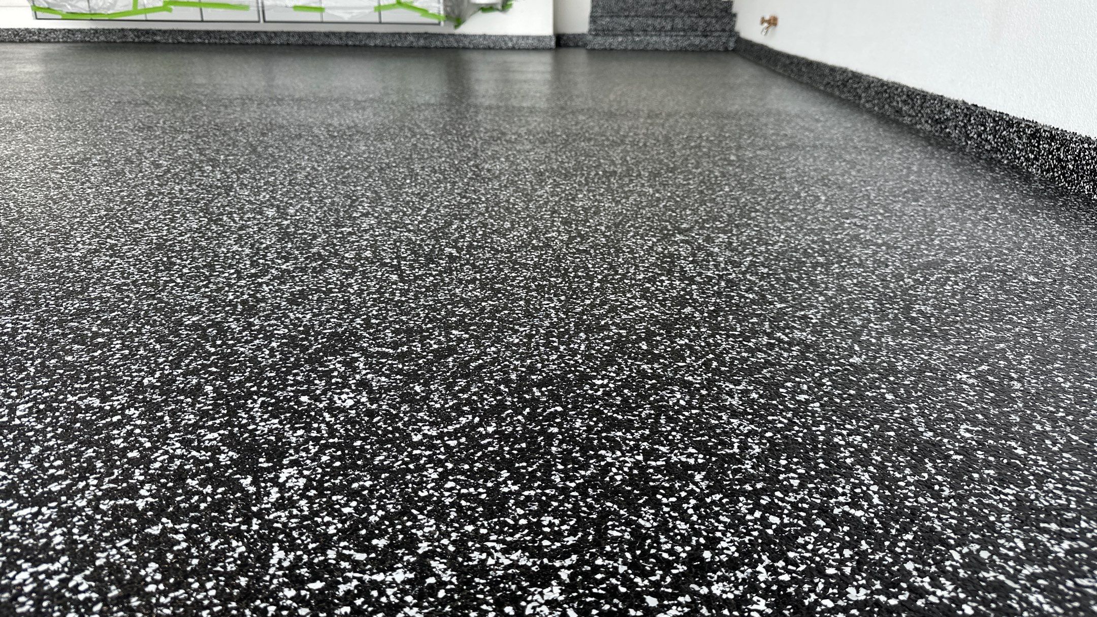 John H. received his dream garage with cabinets and a Banner Garage Floor by Banner Garage