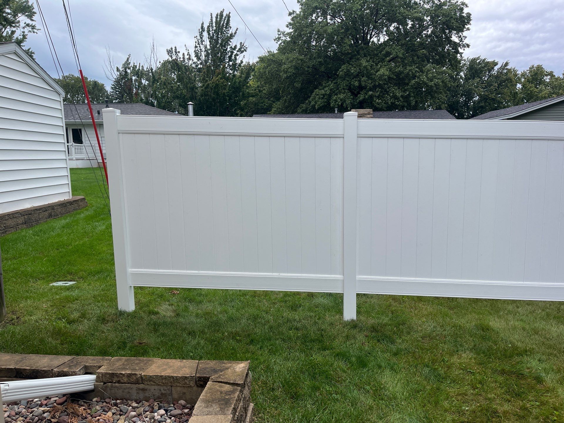 Residential White Vinyl Privacy Fence Enclosure in Waterloo by Perfect Picket Fence and Stain