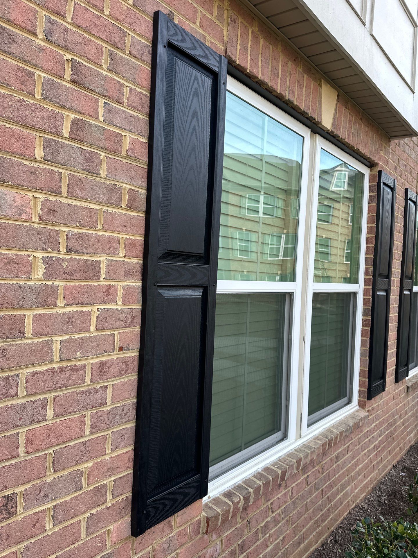 Black Shutters using Mid America Raised Panel by ExteriorPros
