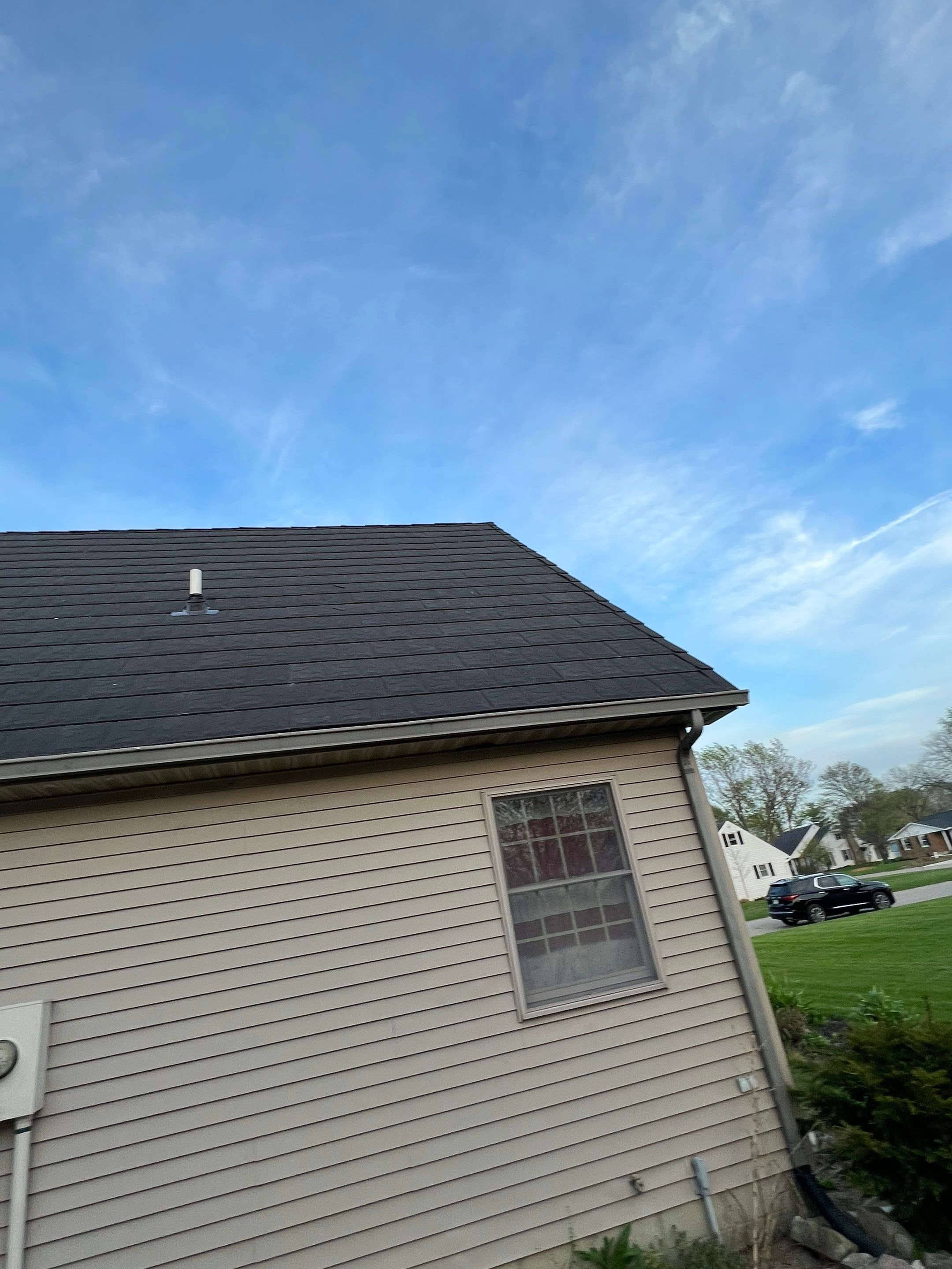 Residential Roofing Repair using Metstar Stone Coated Charcoal by Nitro Roofing and Construction