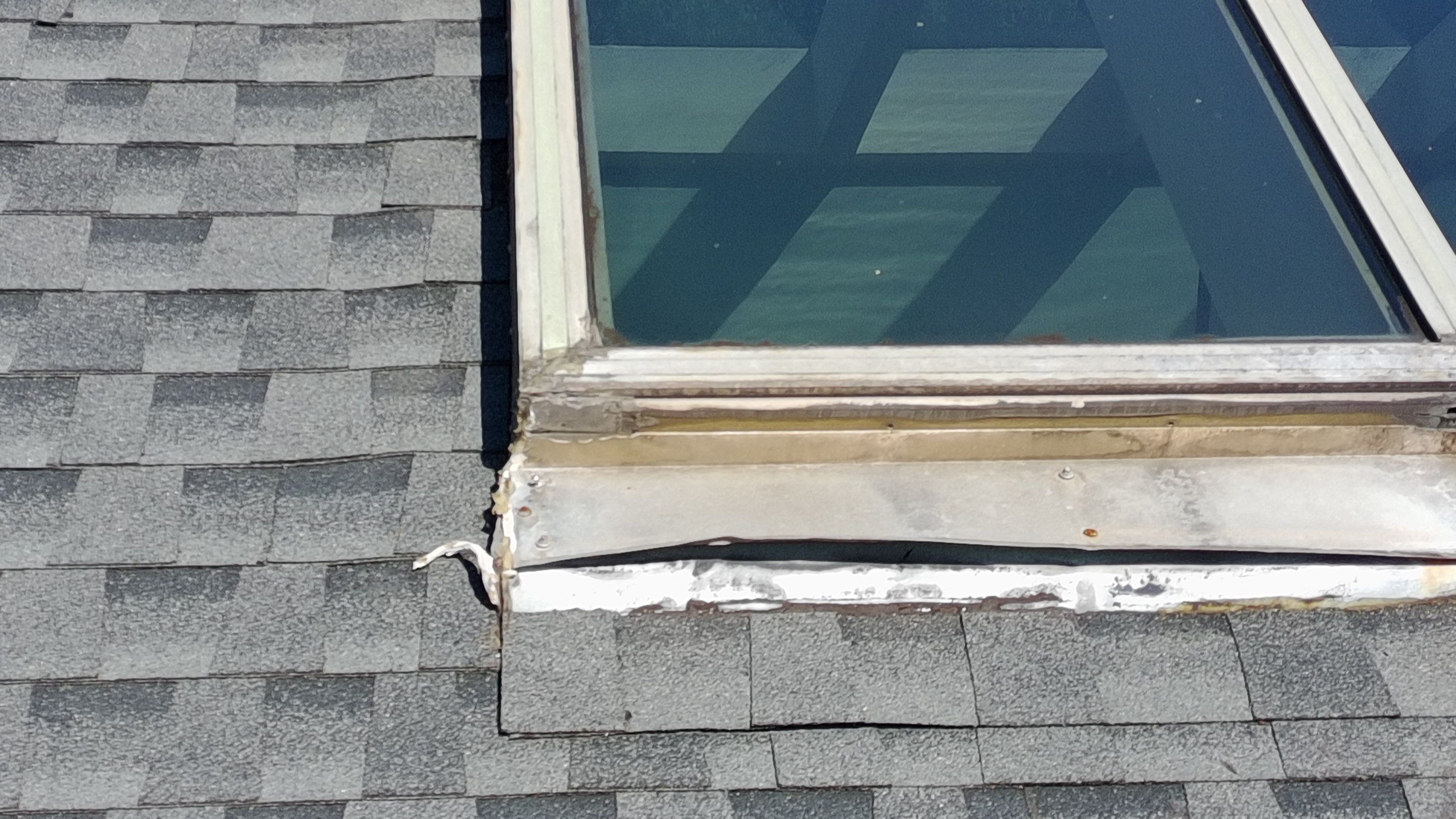 Ridge Skylight Repair and Shingle Roof Maintenance in Winter Park by Fortified Roofing Solutions Corp.