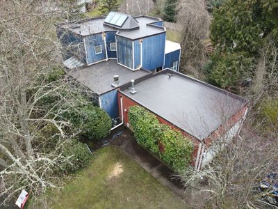 Flat Roof Replacement in Redmond with Custom Skylight using Duro-Last PVC