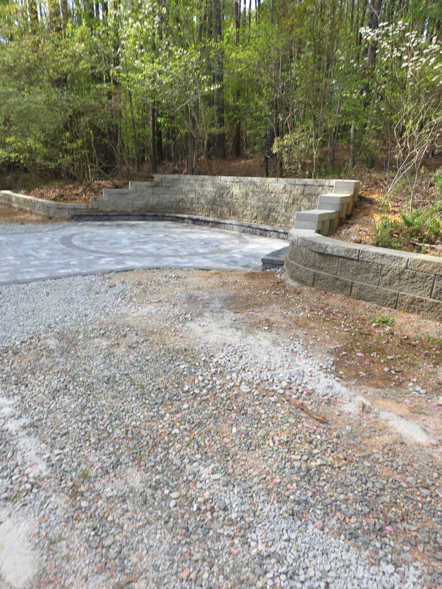 Pittsboro Outdoor Living Transformation – Retaining Wall, Paver Patio & Elevated Deck by Elite Remodeling and Design LLC