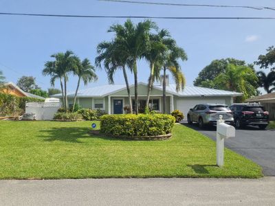 Residential Roofing Installation using 1" Nail strip metal roof