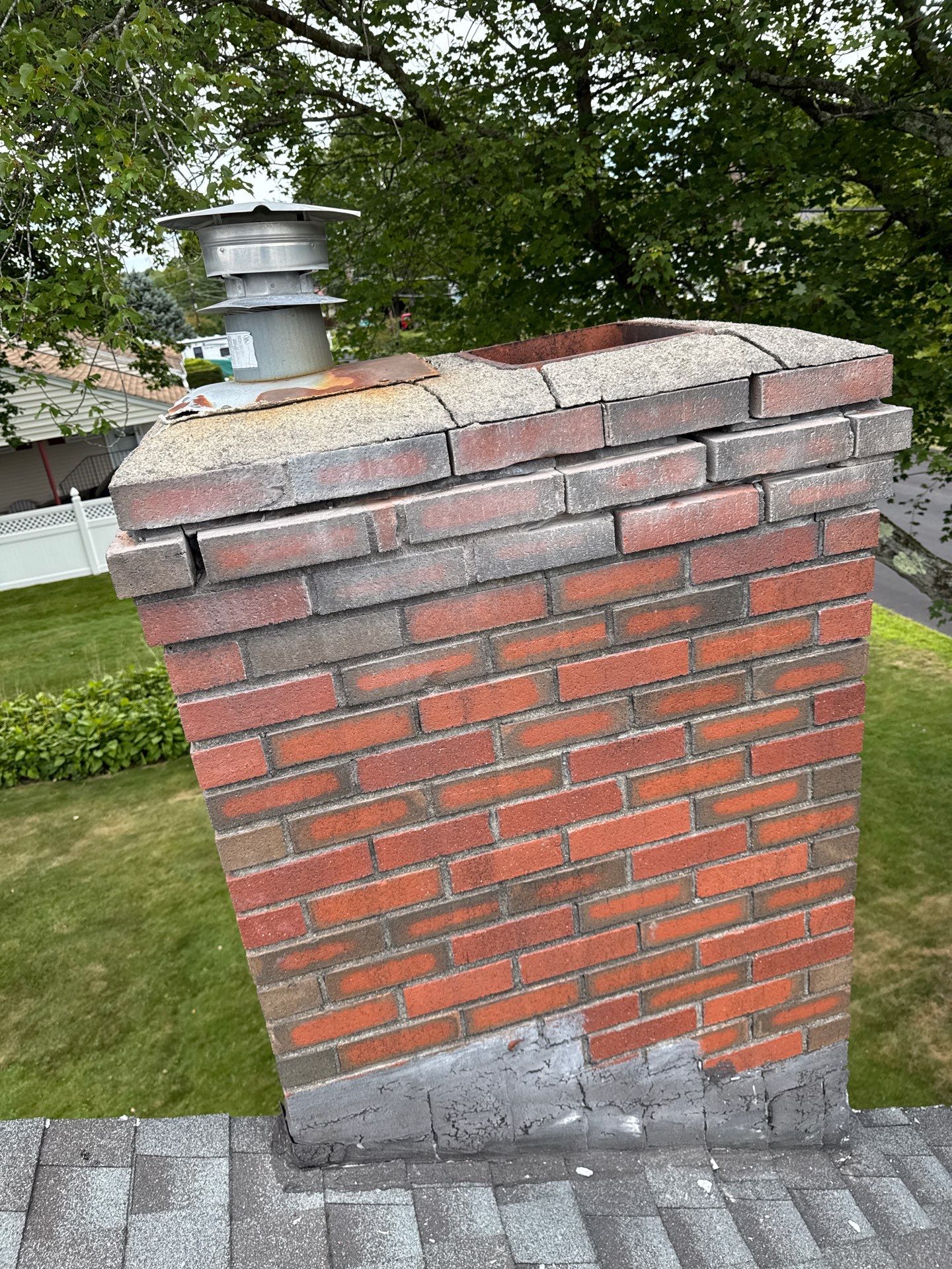 Lowell Premium Velux Curb-Mount Skylight & Chimney Restoration by Mighty Dog Roofing of Greater Middlesex County