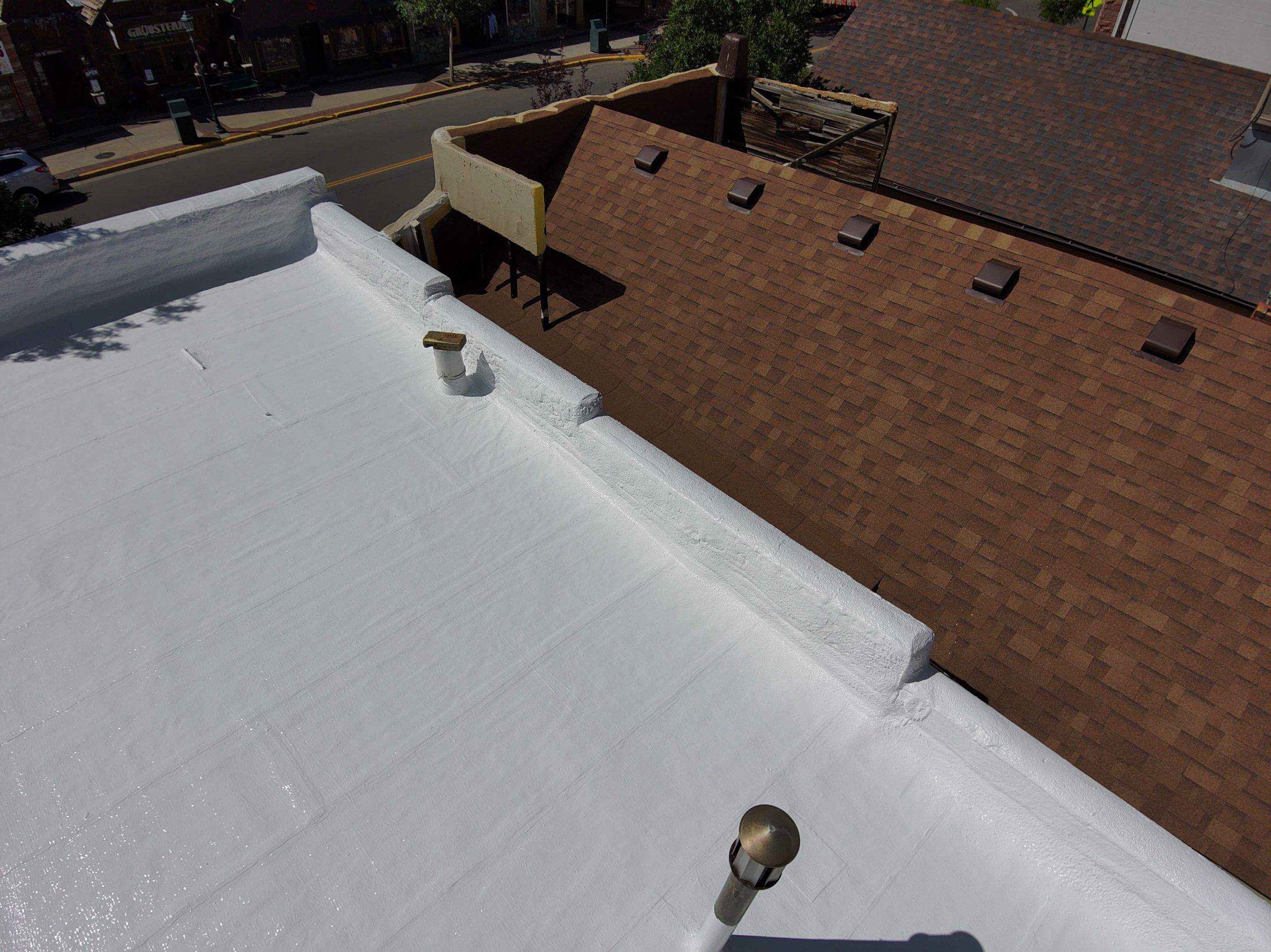 Estes Park "The Taffy Shop" Before & After Gaco Coating by Blue Peaks Roofing LLC