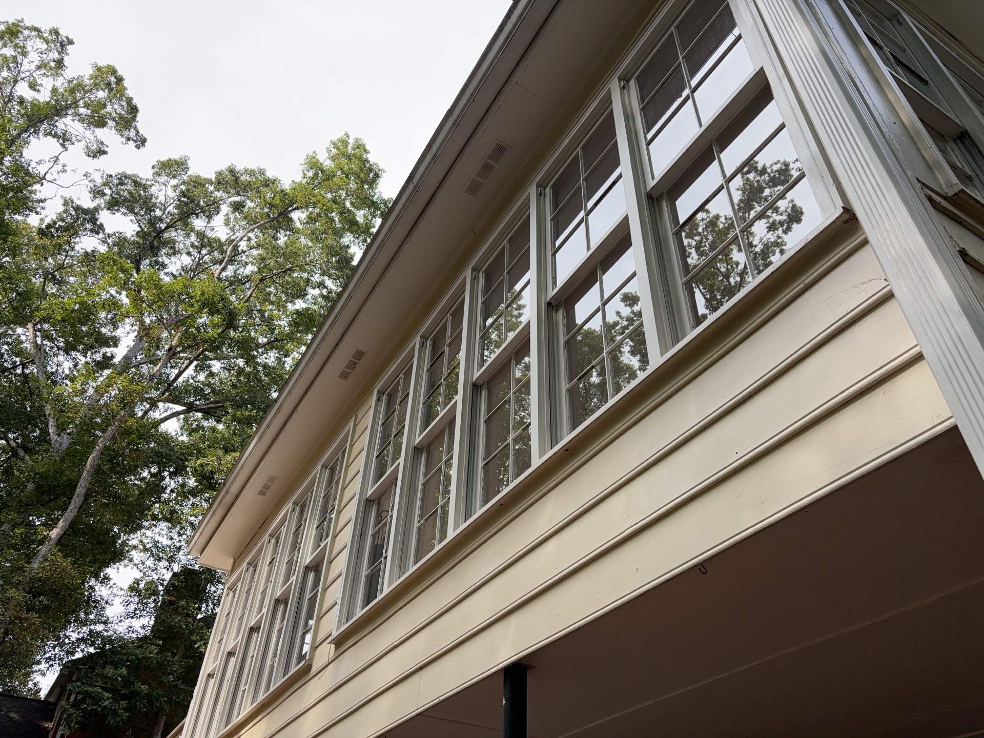 53 Window Replacements with Master 2800 Series Vinyl Replacement Windows and James Hardie Siding Installation by Nelson Exteriors 