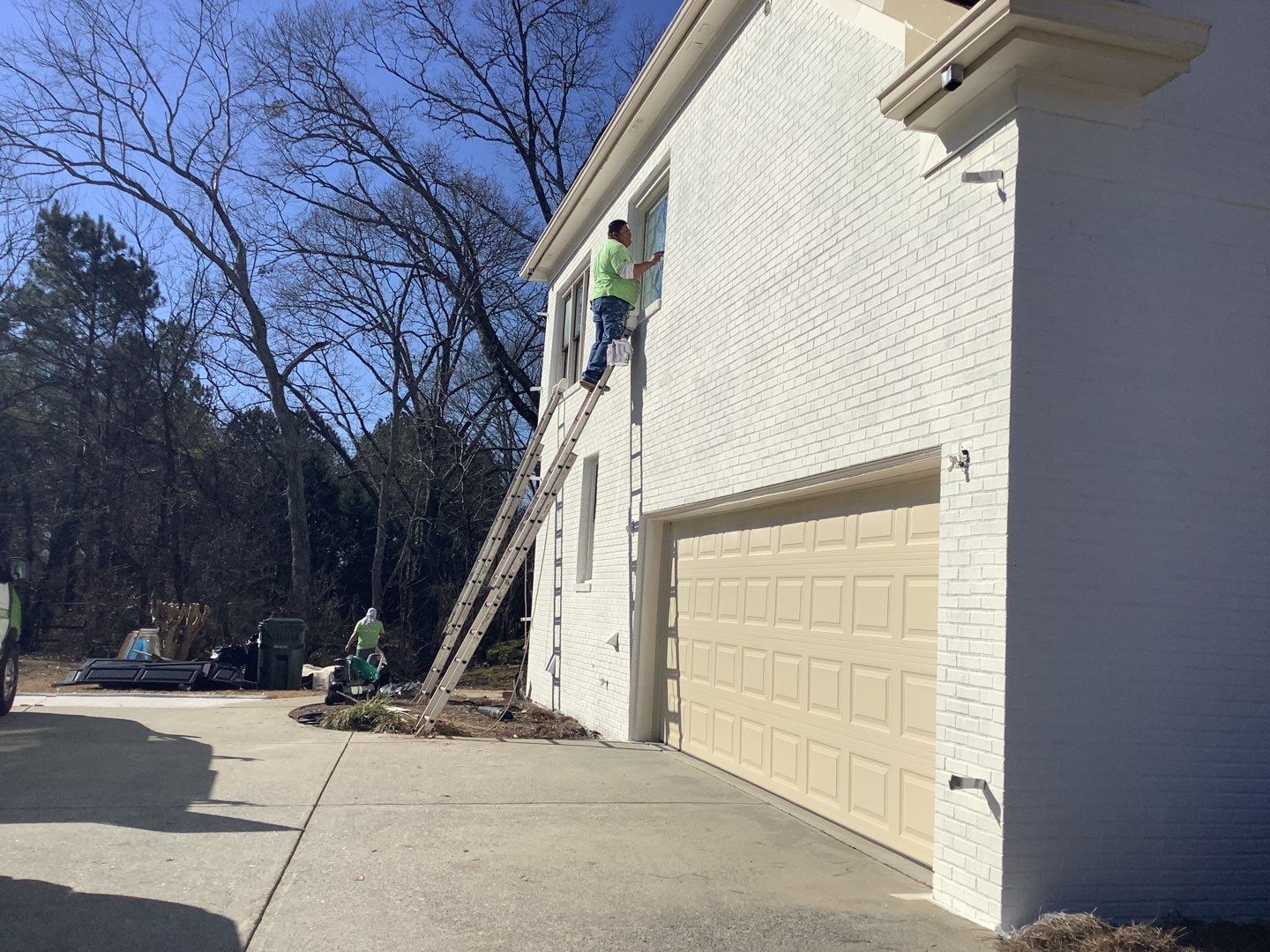 White Brick Exterior Painting and Deck Refinishing in Duluth by Swift Home Renovations