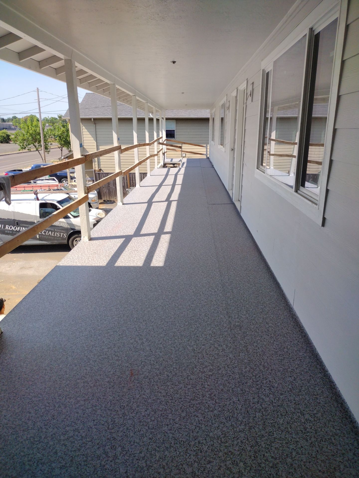 Dec-Tec Walkable Membrane using Dec-Tec (Color: Granite) by Orezona Building & Roofing Company, Inc.