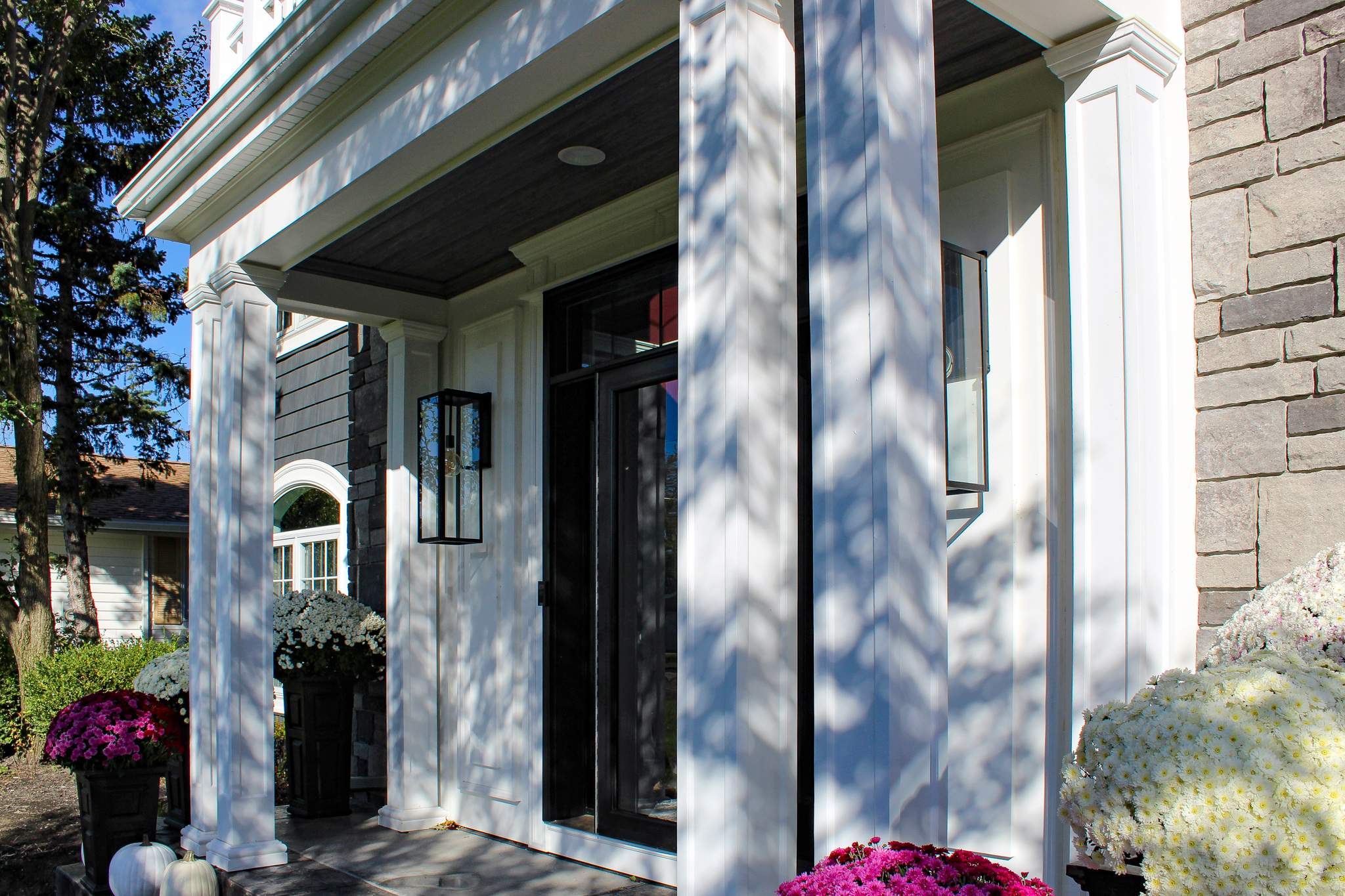 Exterior Renovations- Siding, Concrete, Railings, and Entry Door  by Ivy Lea Construction