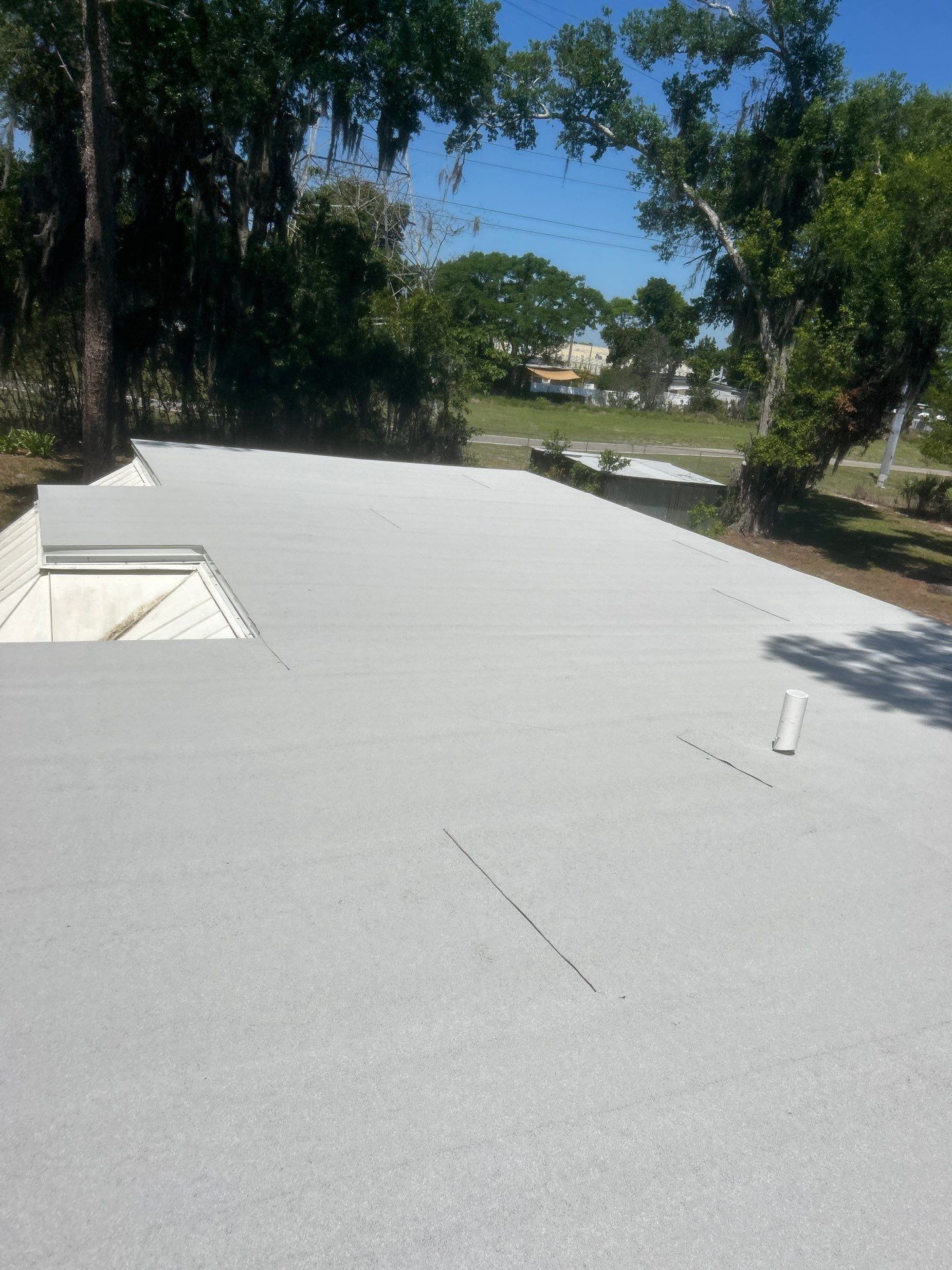 Flat Roof Replacement and Wood Decking Repair in Maitland by Tip Top Roofing Co., Inc.