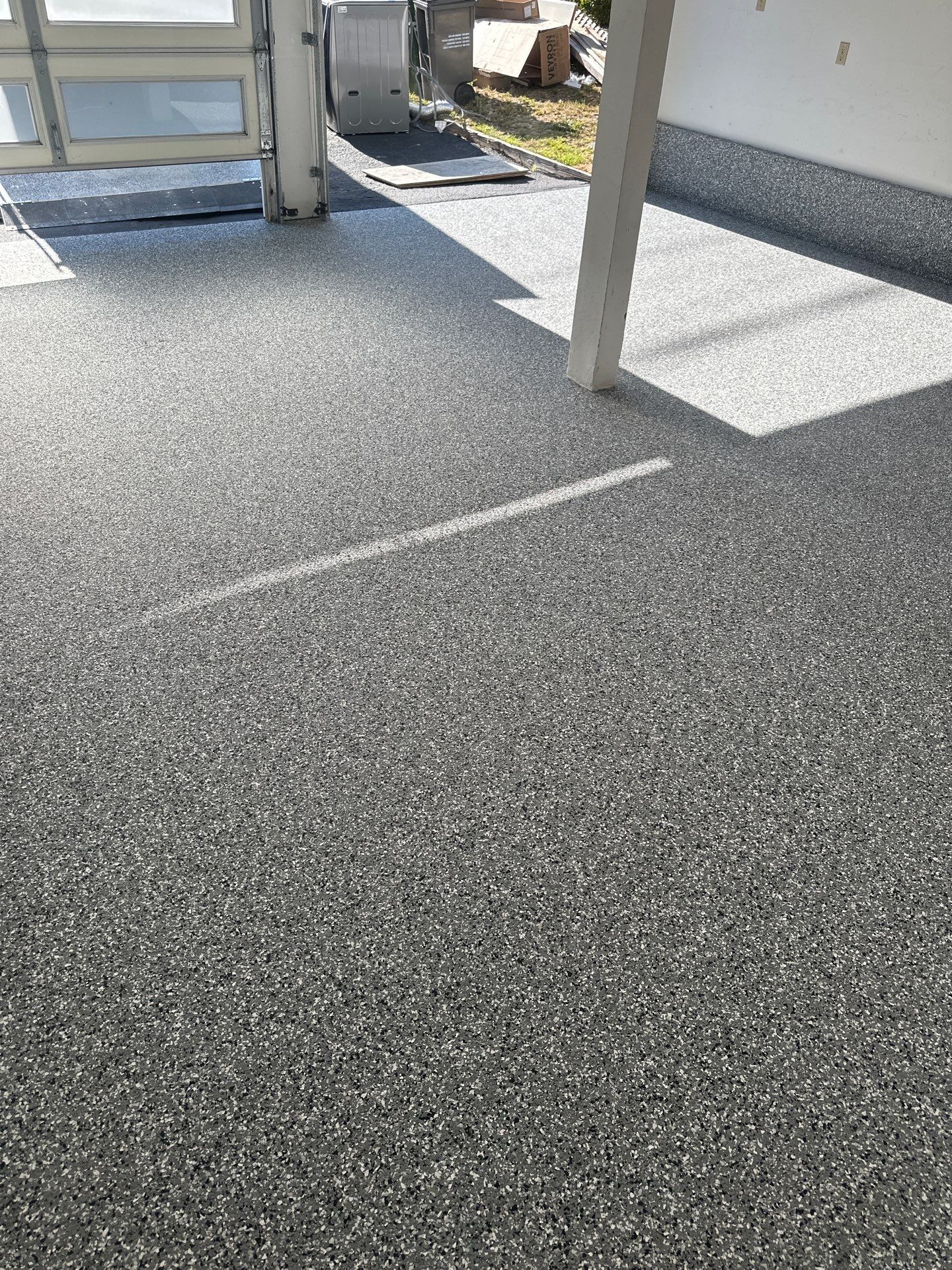 Polyurea Garage Floor Coating with Simiron Wombat Chip Finish by MGP Coatings