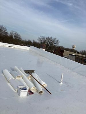 Roof Recover on a downtown building in Lake City 
