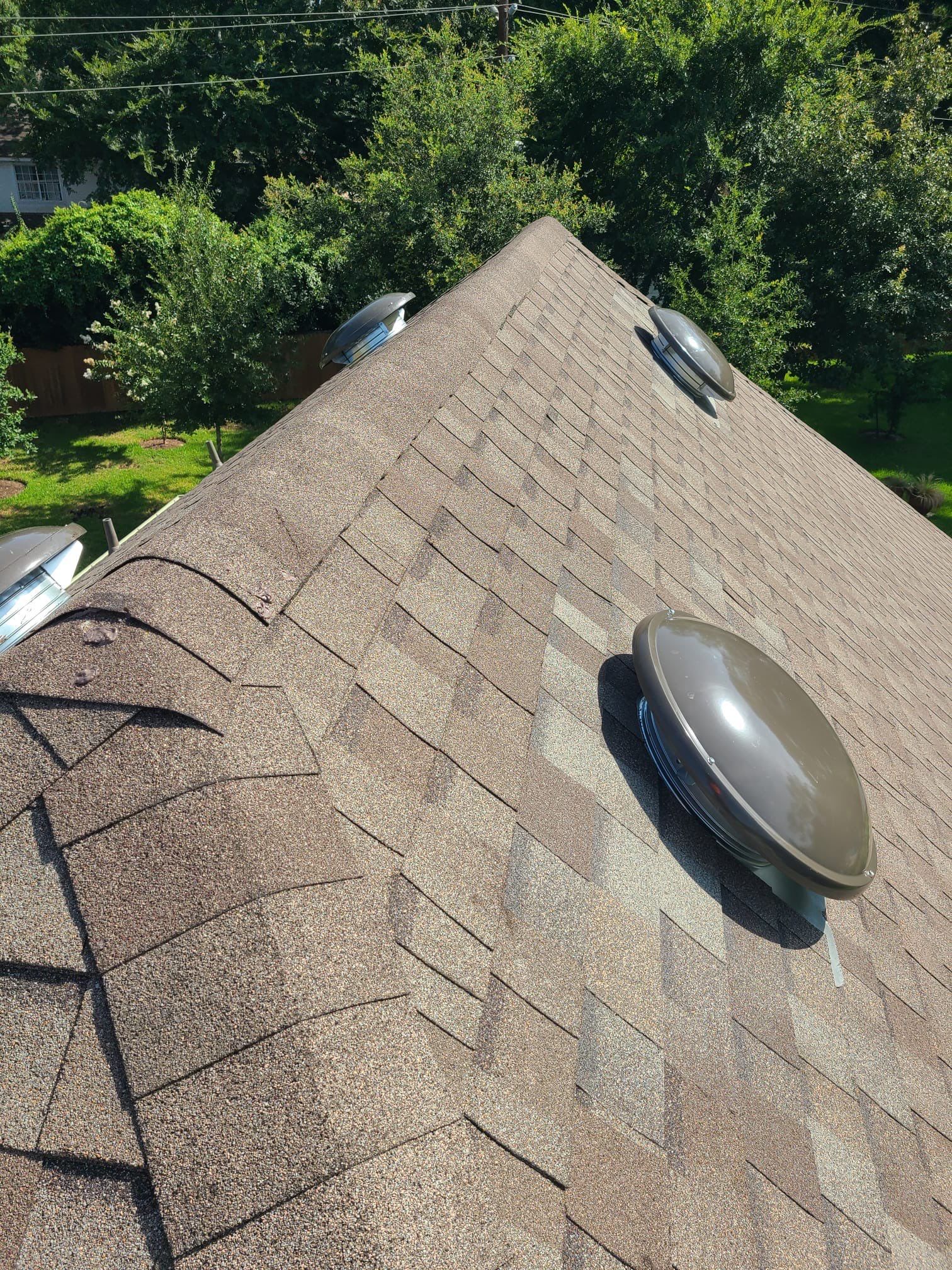 Hail Damage using Owen's Corning Duration (Lifetime) Shingles by Roof Repair Company
