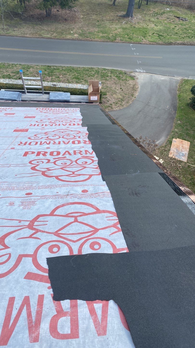 Residential Roofing Installation using Vermont Slate by A Plus Exterior