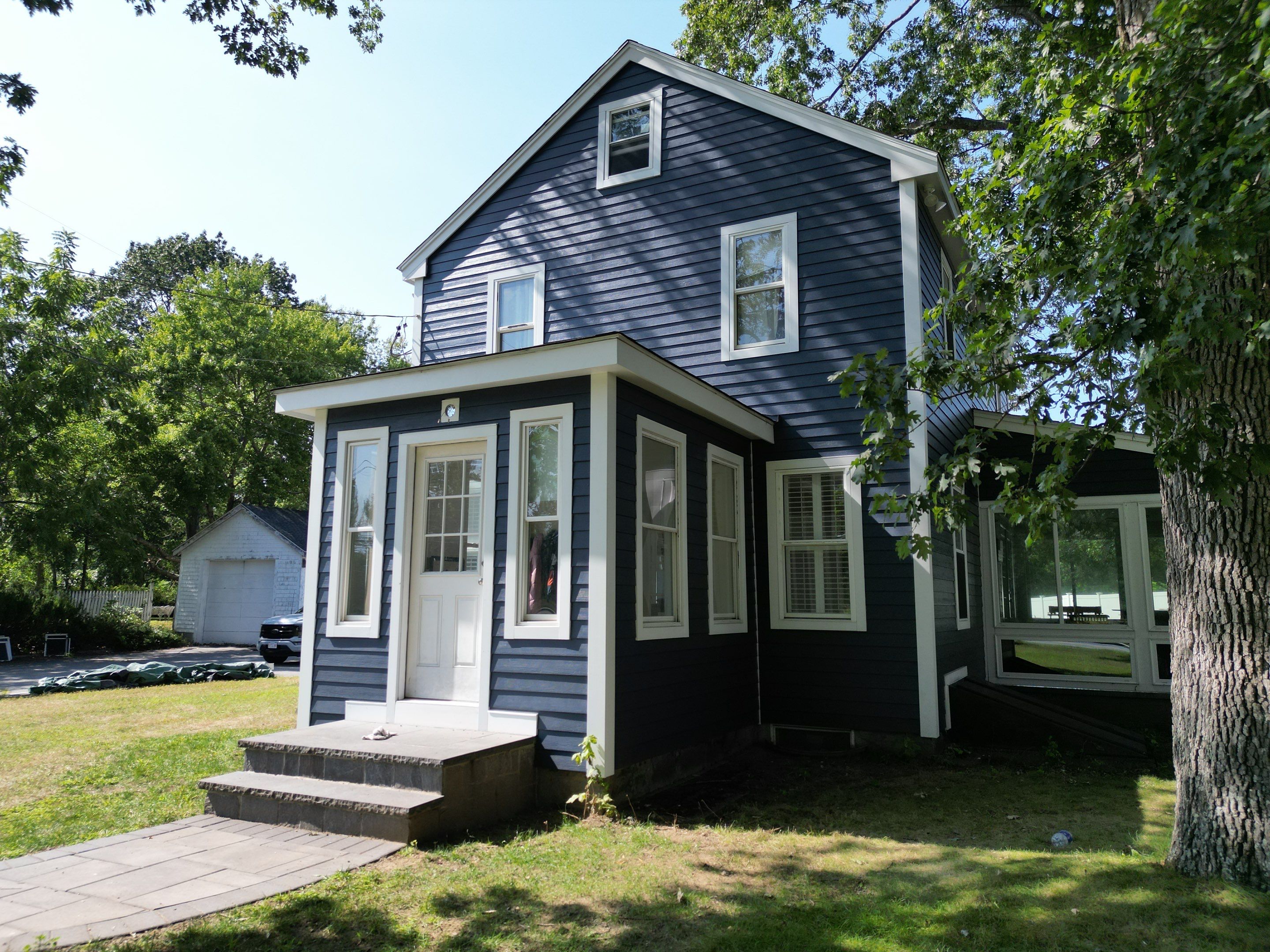 James Hardie Lap Siding Installation in Chelmsford, MA by Mighty Dog Roofing of Greater Middlesex County